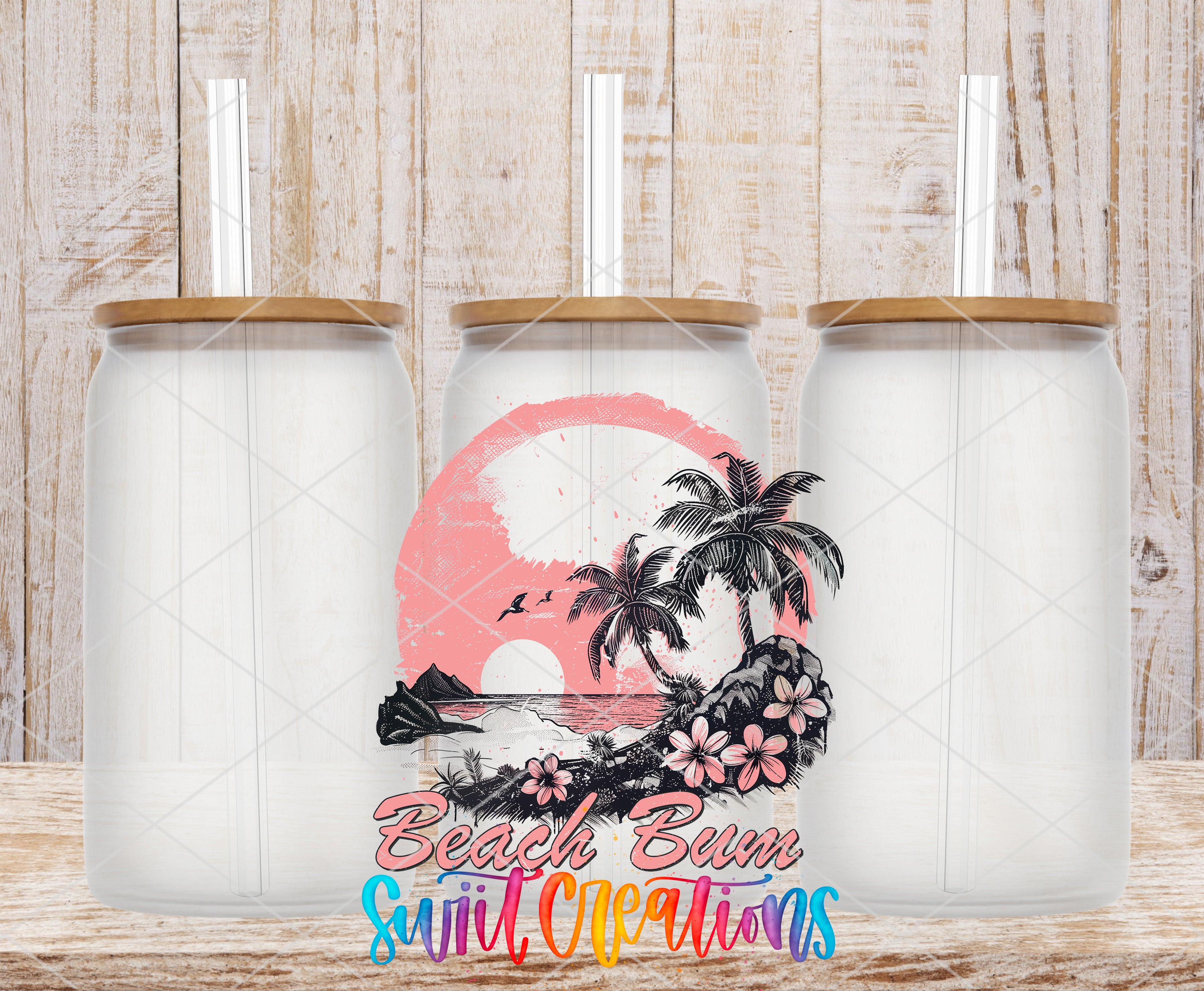 Swiit Creations UV DTF Beach Bum Tropical Sunset transfer shown on a clear glass can set