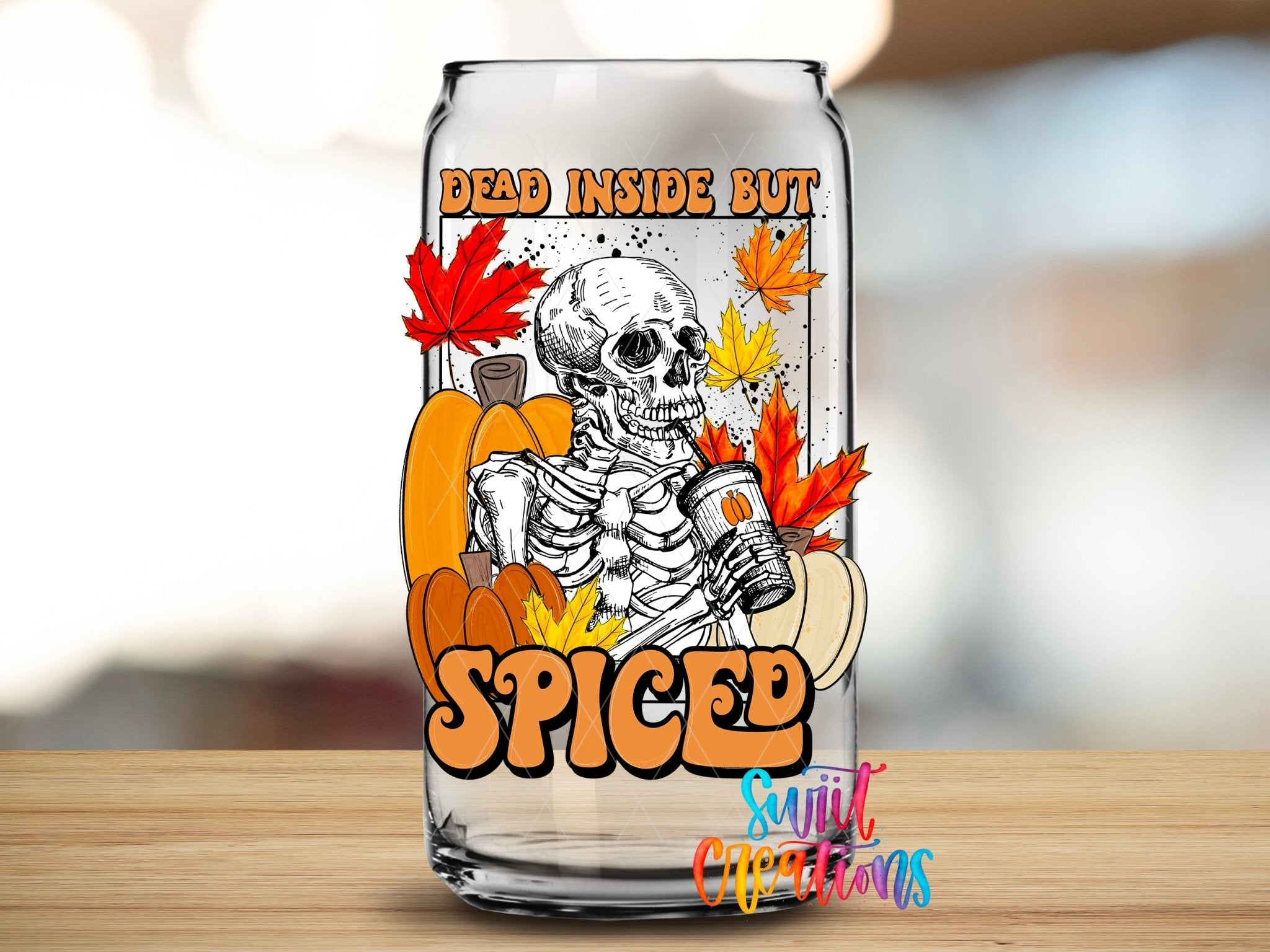 Dead Inside But Spiced Pumpkin Skeleton UV DTF transfer applied to a clear glass can from Swiit Creations