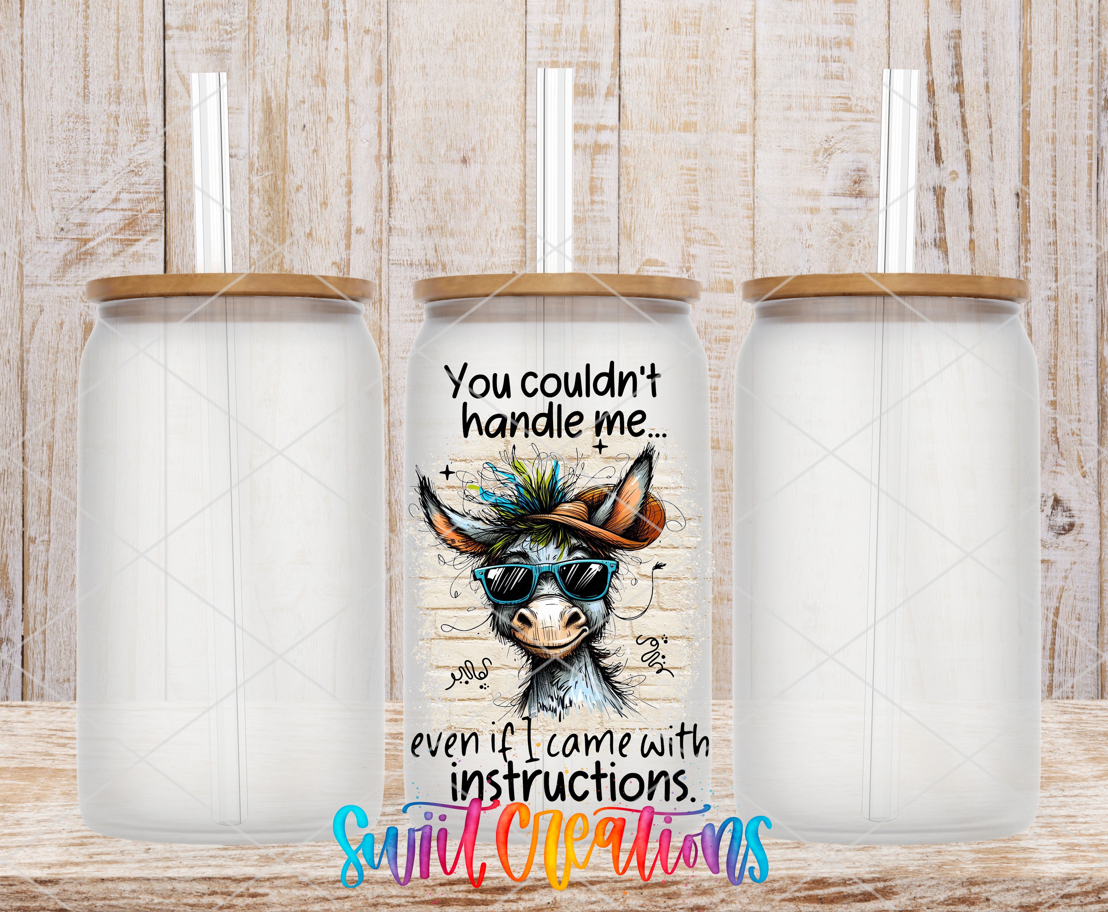 three clear glass tumblers with straws, each with a unique design on the front. The design includes a donkey wearing sunglasses and a hat, along with the text "You couldn't handle me... even if I came with instructions."