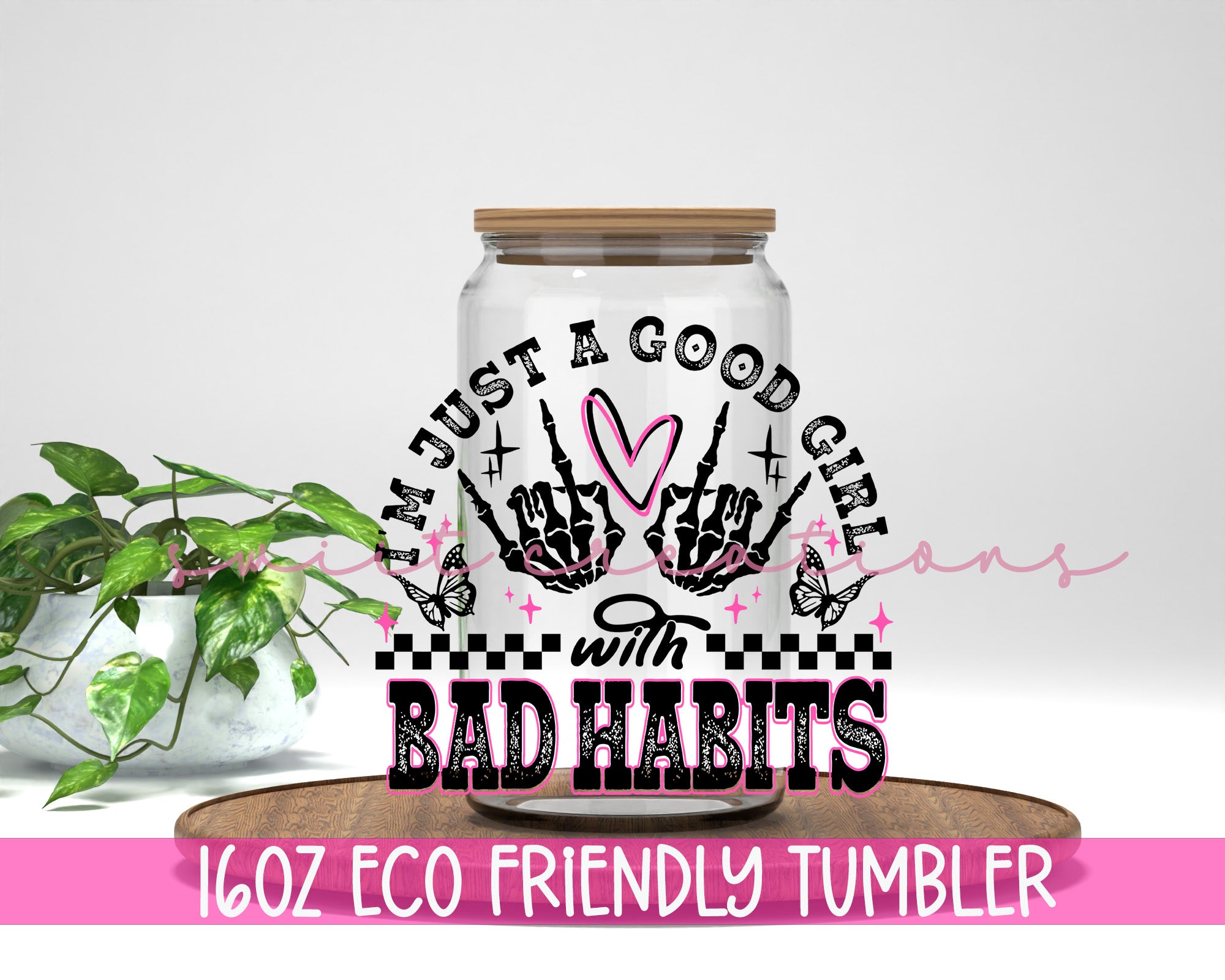 a jar with a plant in it and the words bad habitts on it