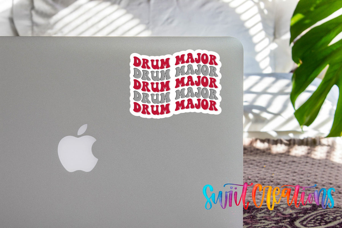 Red and Gray Drum Major sticker on the lid of a silver laptop