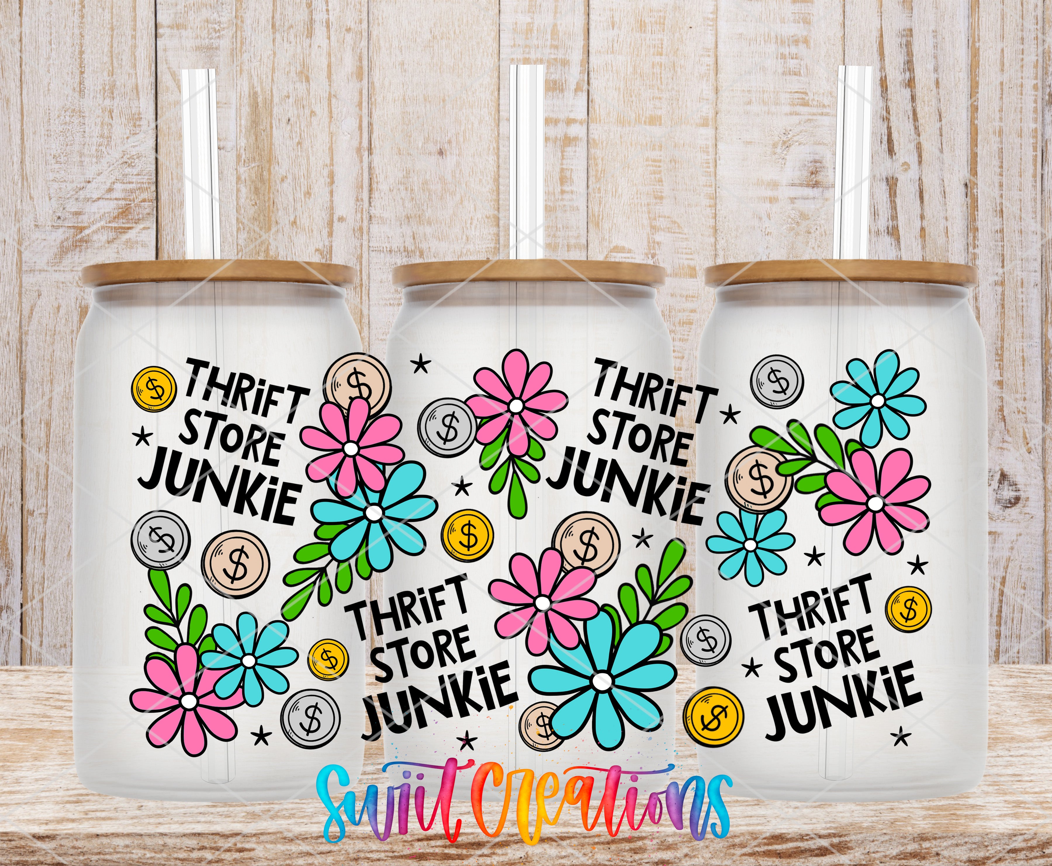 Thrift Store Junkie UV DTF Full Wrap mockup on three frosted glass cans with wood lids
