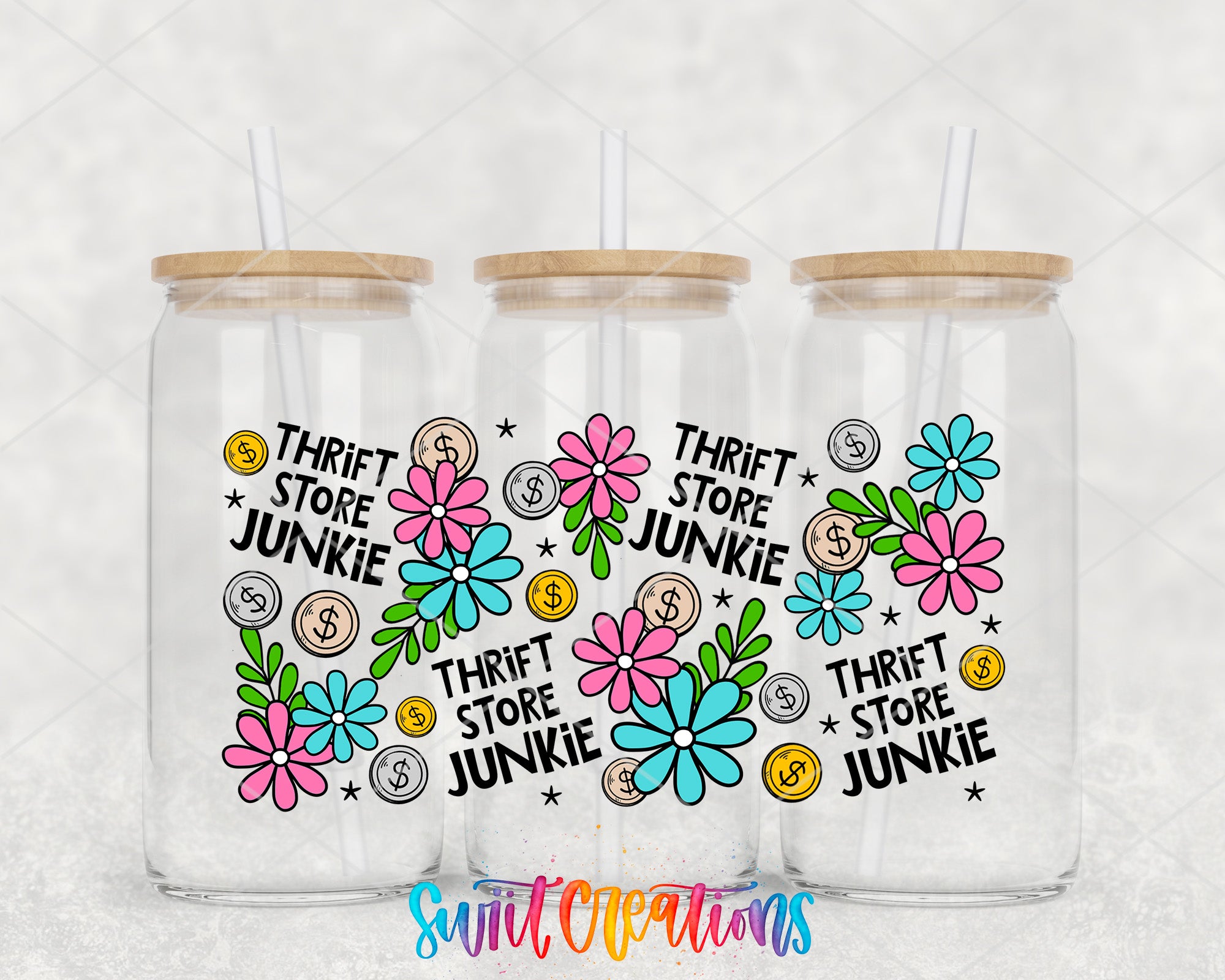 Thrift Store Junkie colorful UV DTF Full Wrap displayed on three clear glass cans