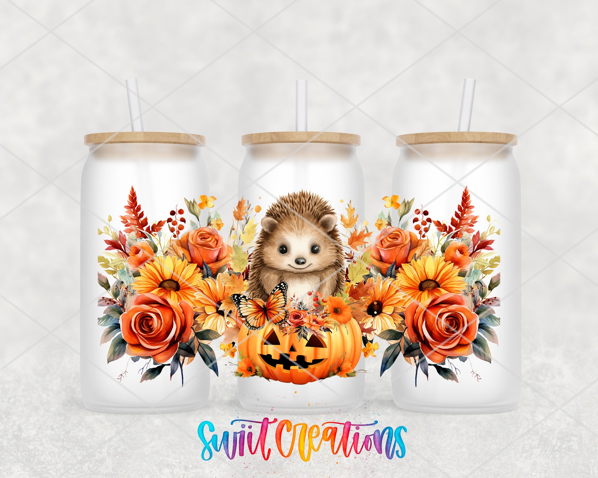A trio of white tumblers adorned with autumnal floral designs, including a hedgehog, pumpkins, sunflowers, and roses.