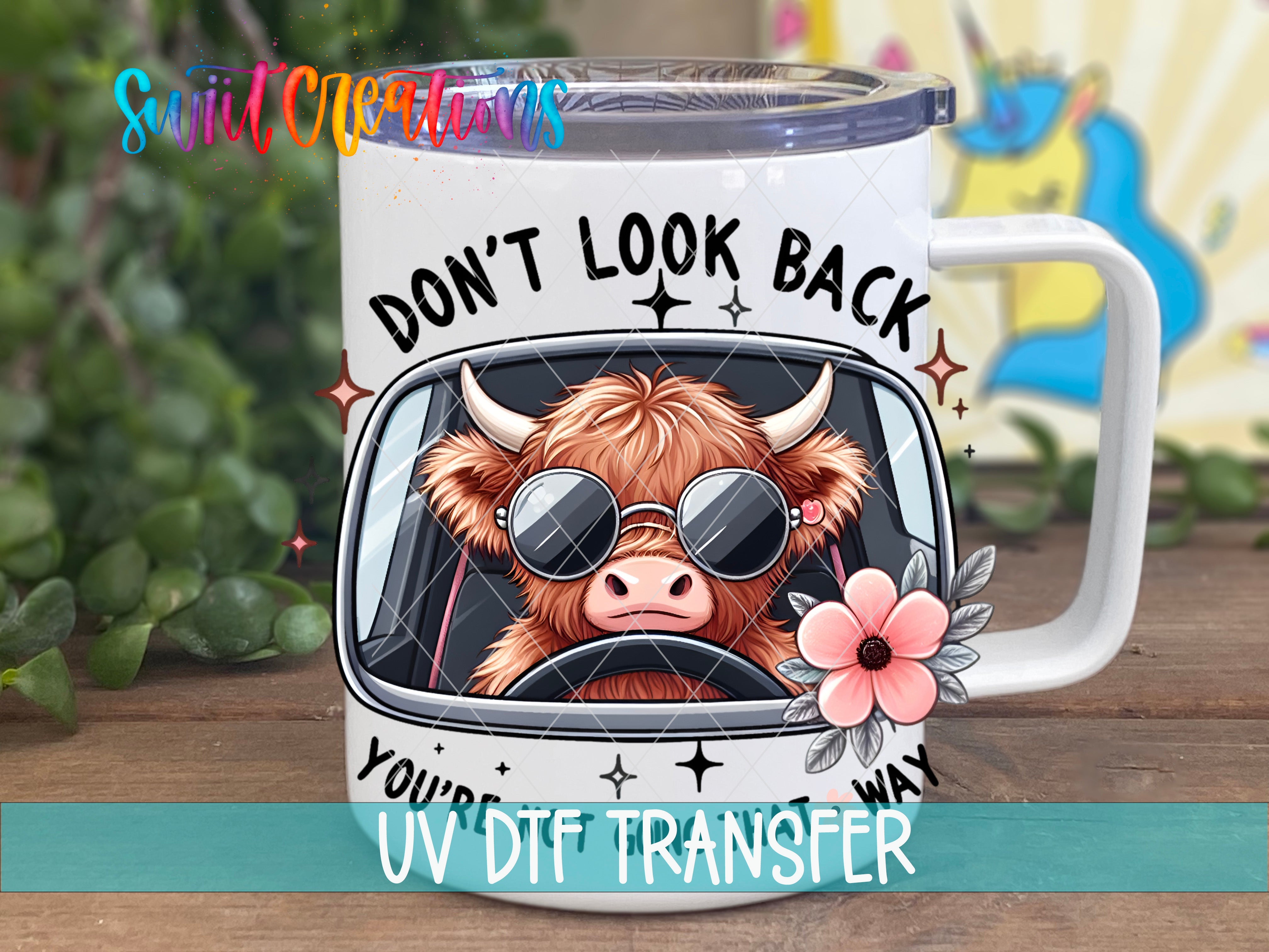 Swiit Creations UV DTF Don't Look Back Cow transfer displayed on a white coffee mug