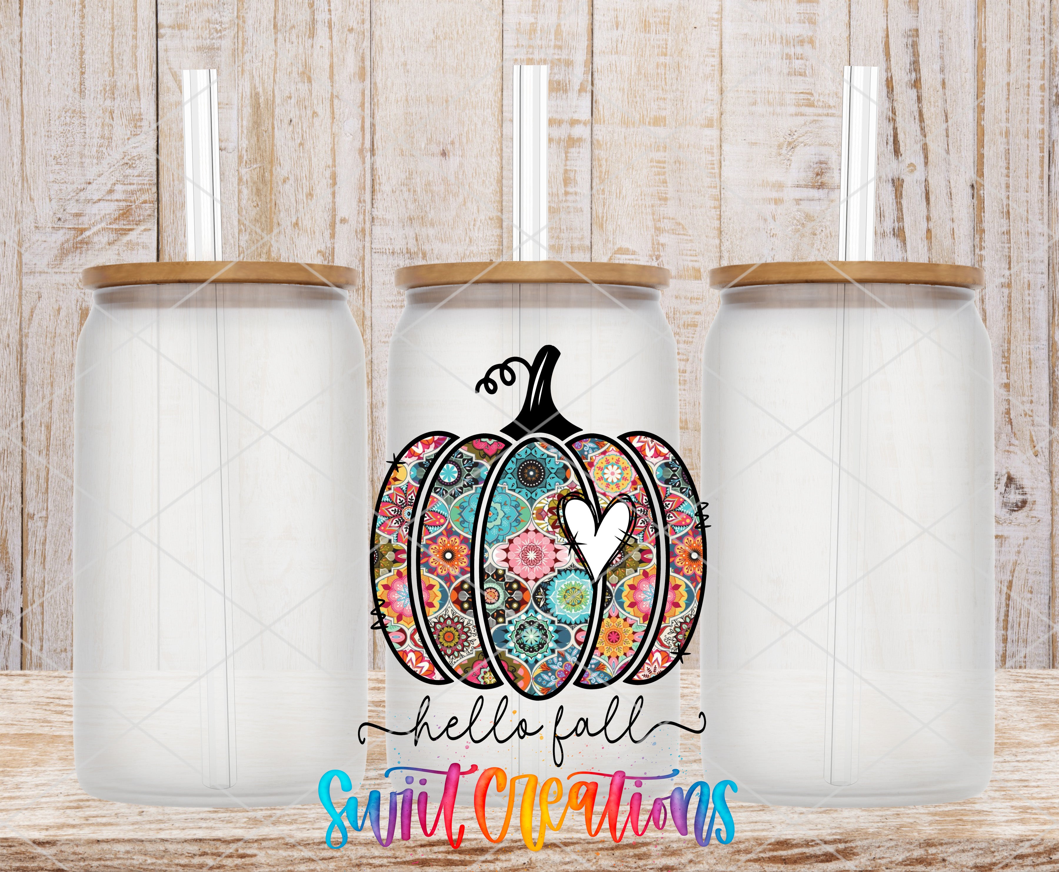 Swiit Creations UV DTF Hello Fall Pumpkin transfer shown on a clear glass can set