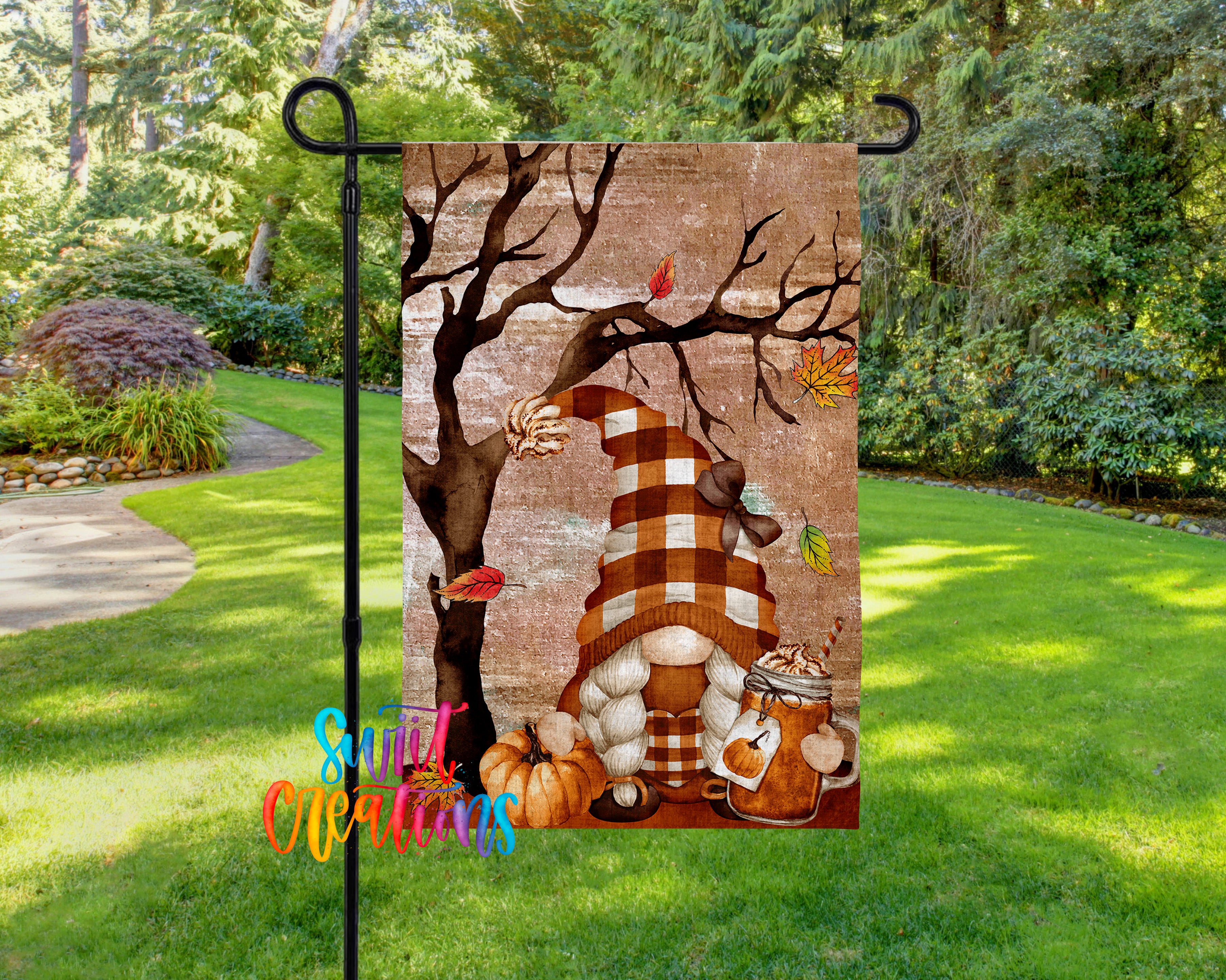 A garden gnome is depicted sitting on a bench under a tree with autumn leaves, surrounded by pumpkins and a mug of hot chocolate.