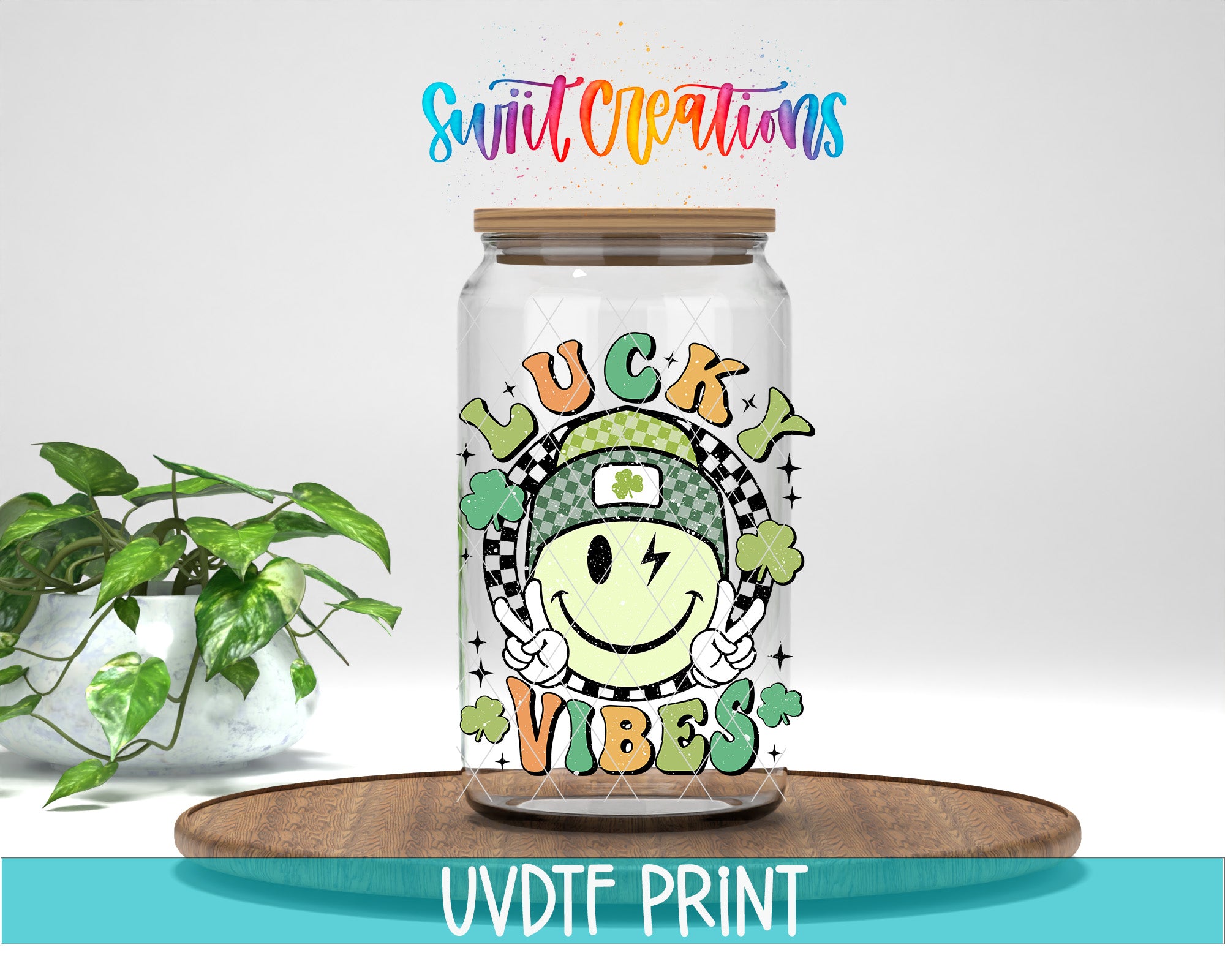 A glass jar with a smiling face and the words "Lucky Vibes" printed on it, placed on a wooden surface.