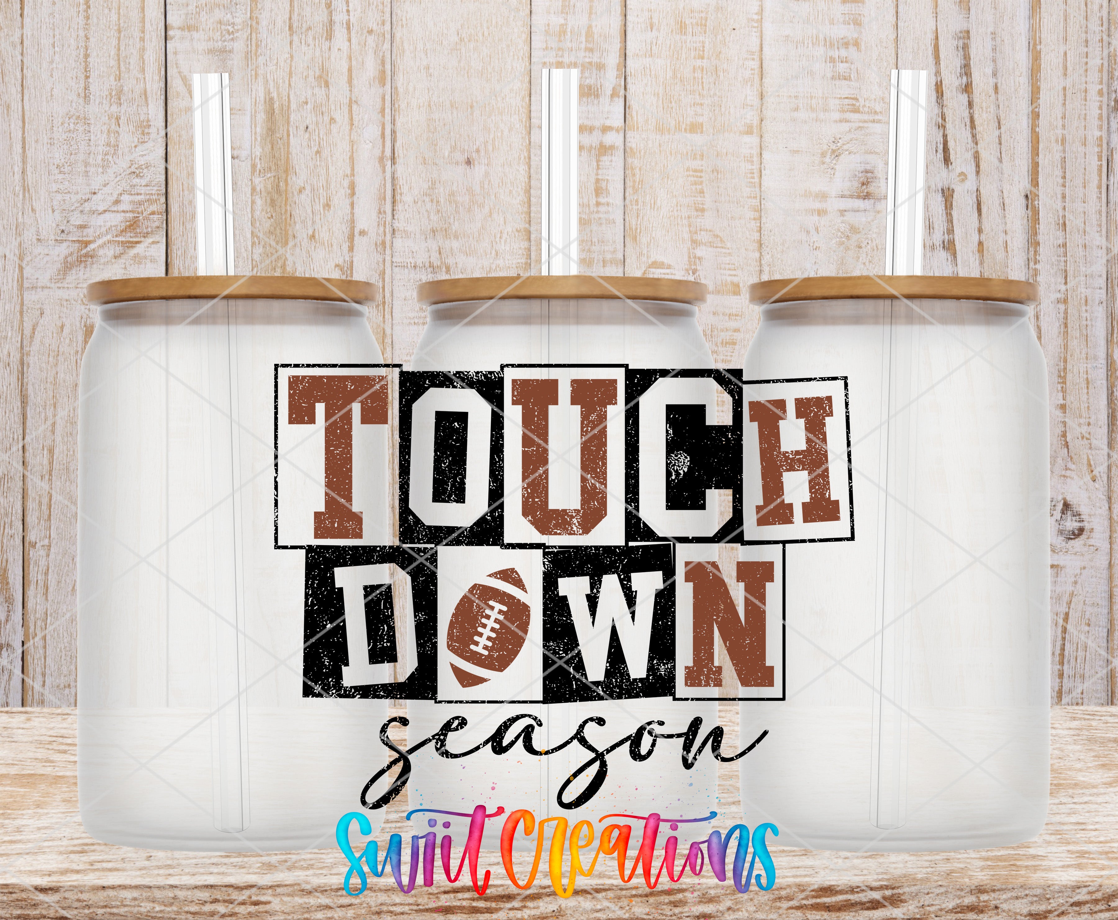Swiit Creations UV DTF Touchdown Season transfer shown on a clear glass can set