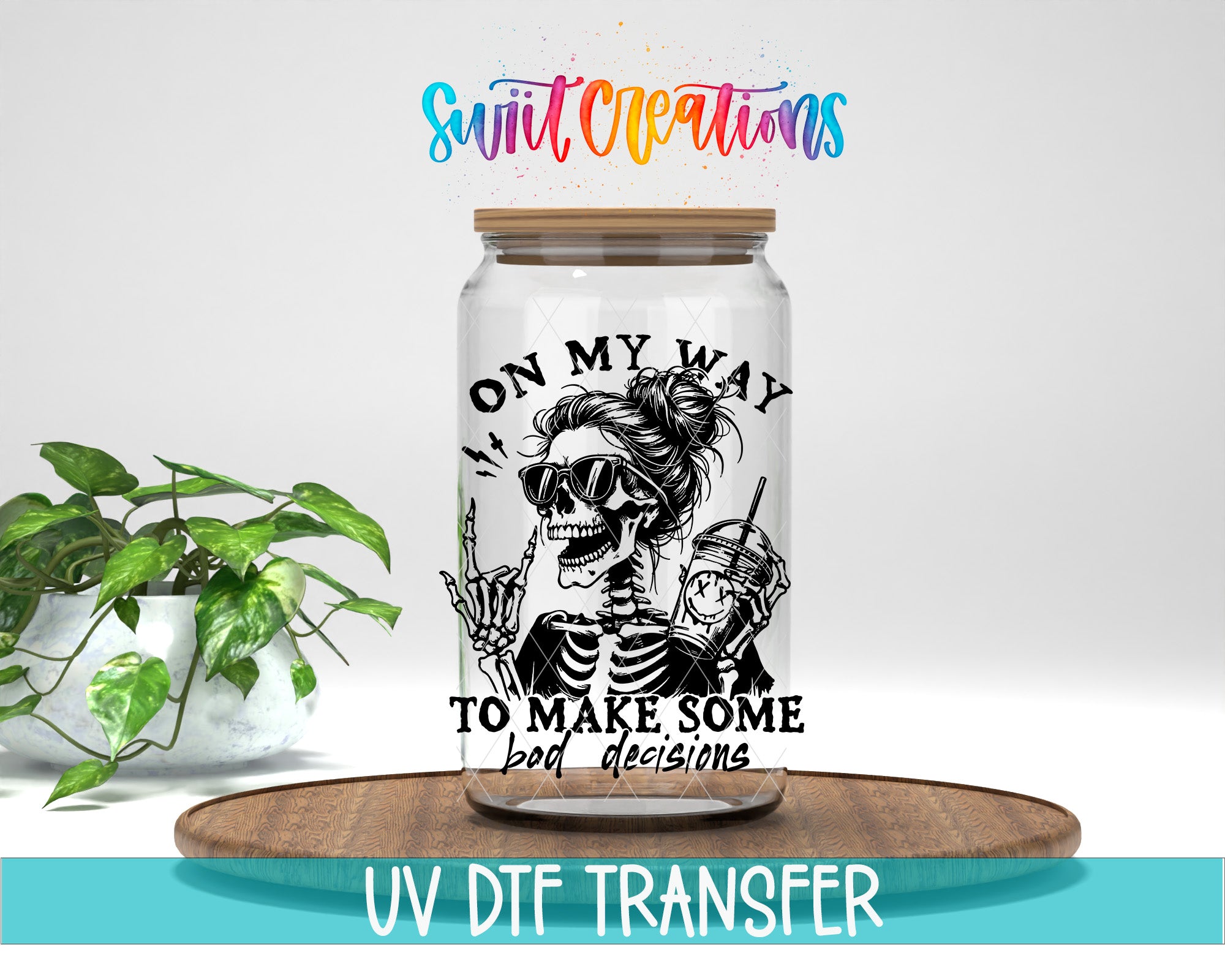a glass jar with a skeleton wearing sunglasses and holding a drink, accompanied by the text "I ON MY WAY TO MAKE SOME BAD DECISIONS" and "UV DFT TRANSFER".