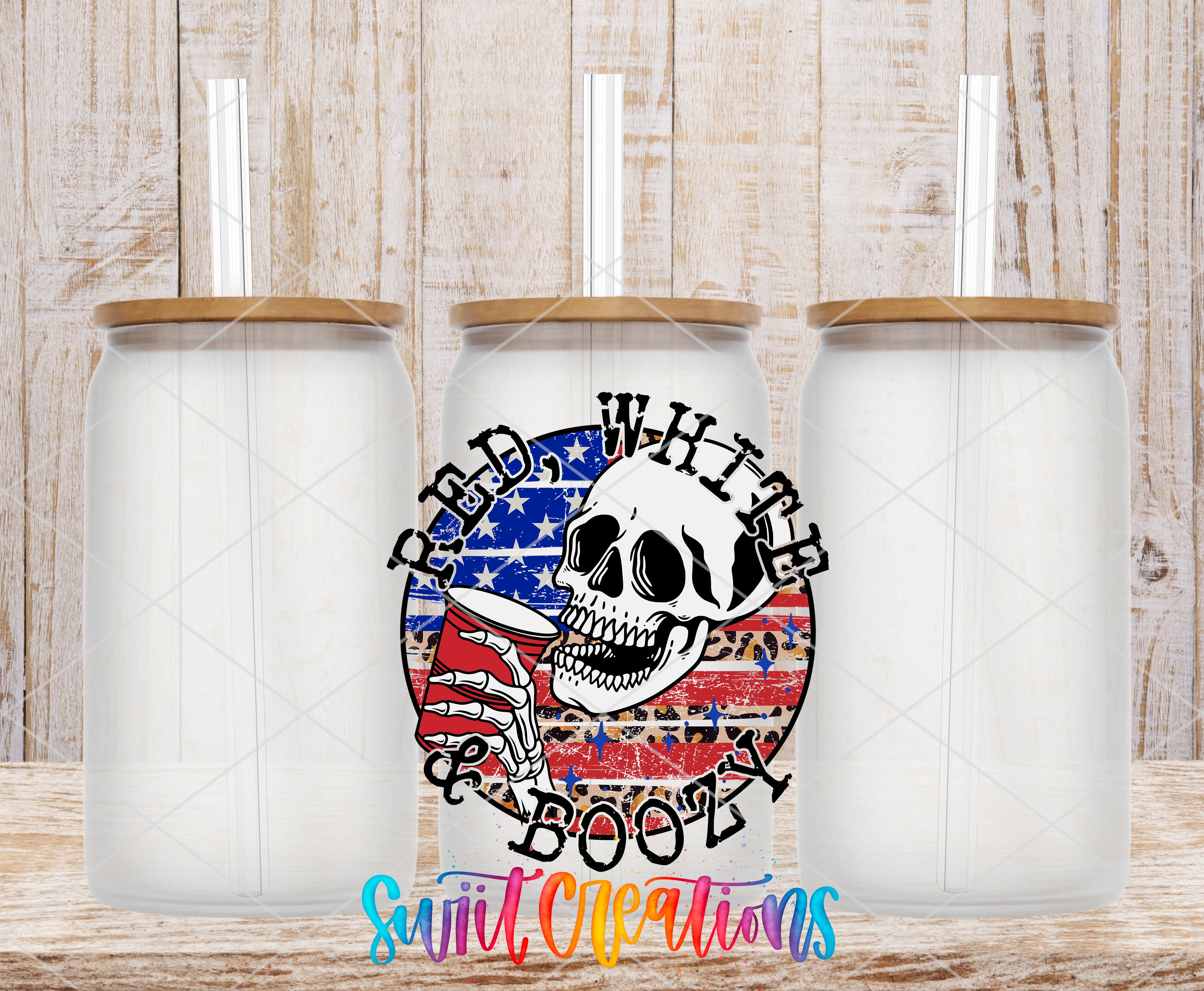 Swiit Creations UV DTF Red White And Boozy Skull transfer shown on a clear glass can set