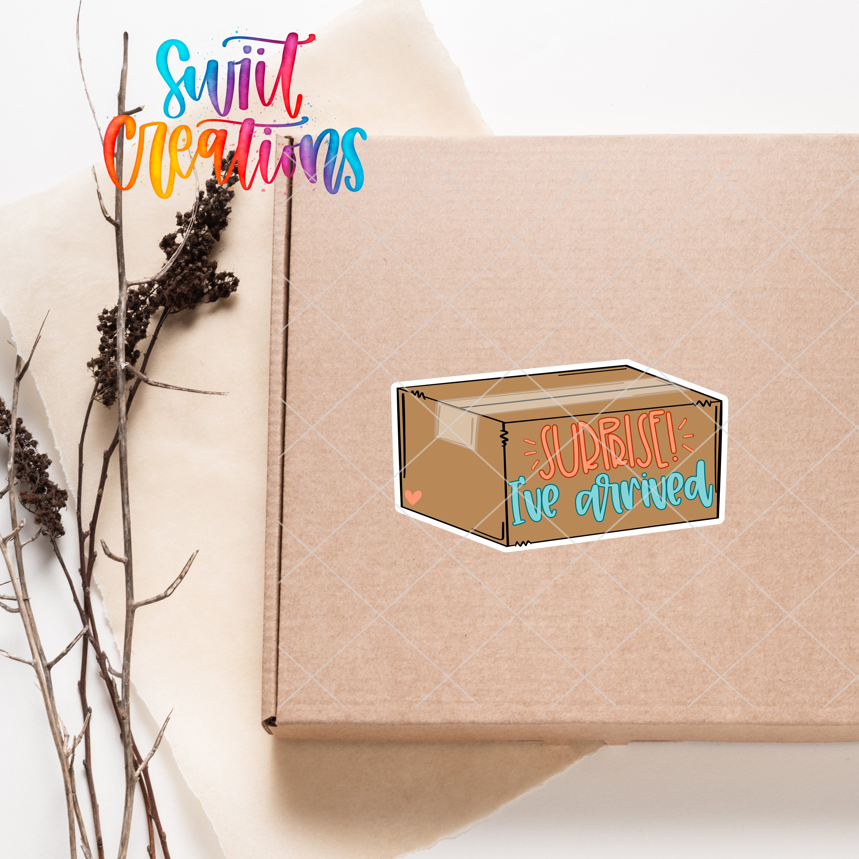 a box with a sticker on it sitting next to a plant