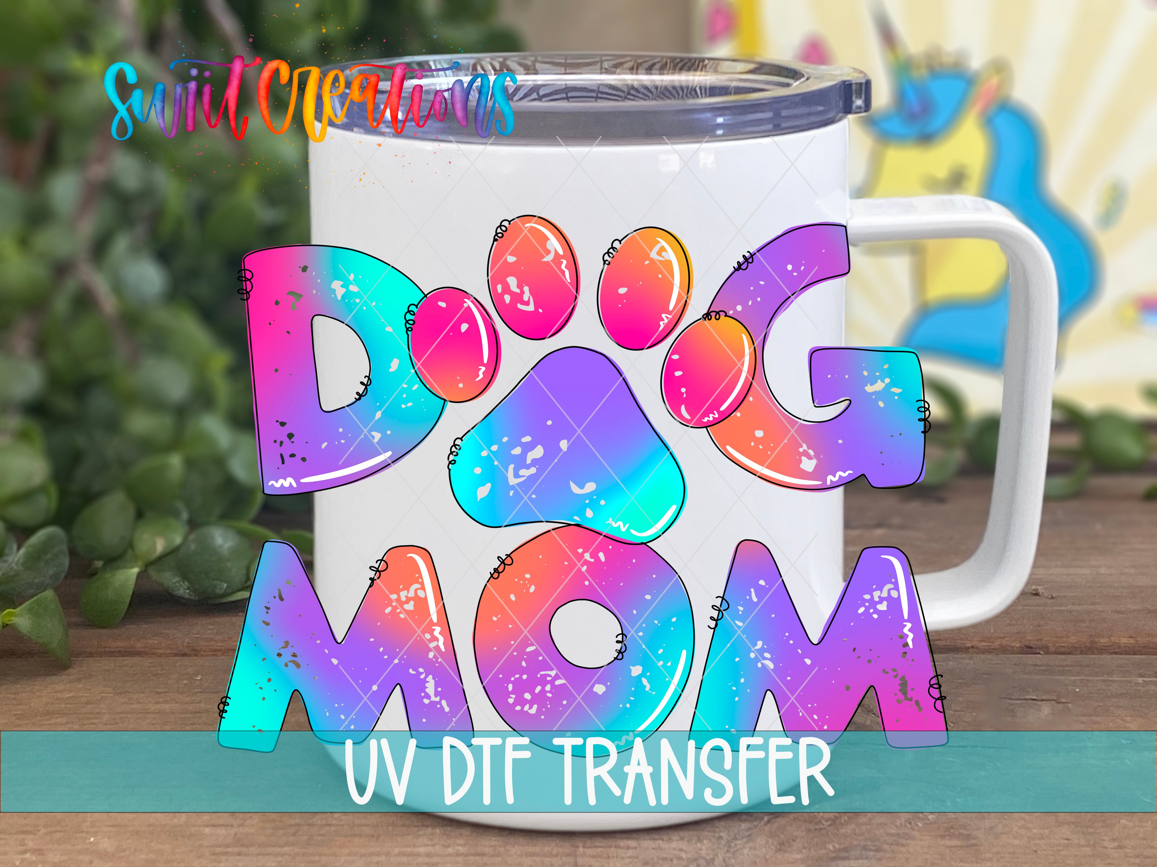 Swiit Creations UV DTF Fur Mama Dog Mom Tie Dye transfer displayed on a white coffee mug