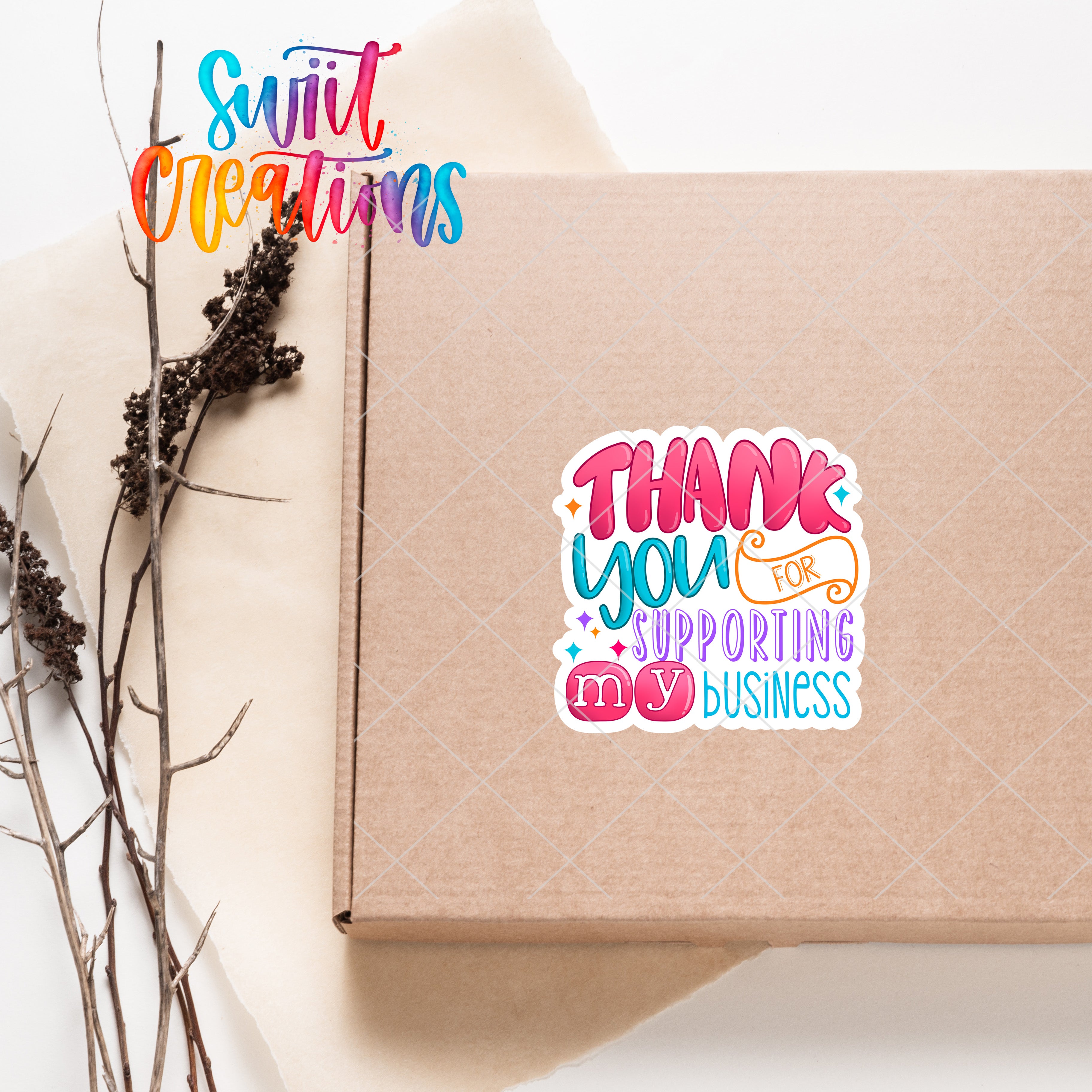 a brown box with a thank you sticker on it