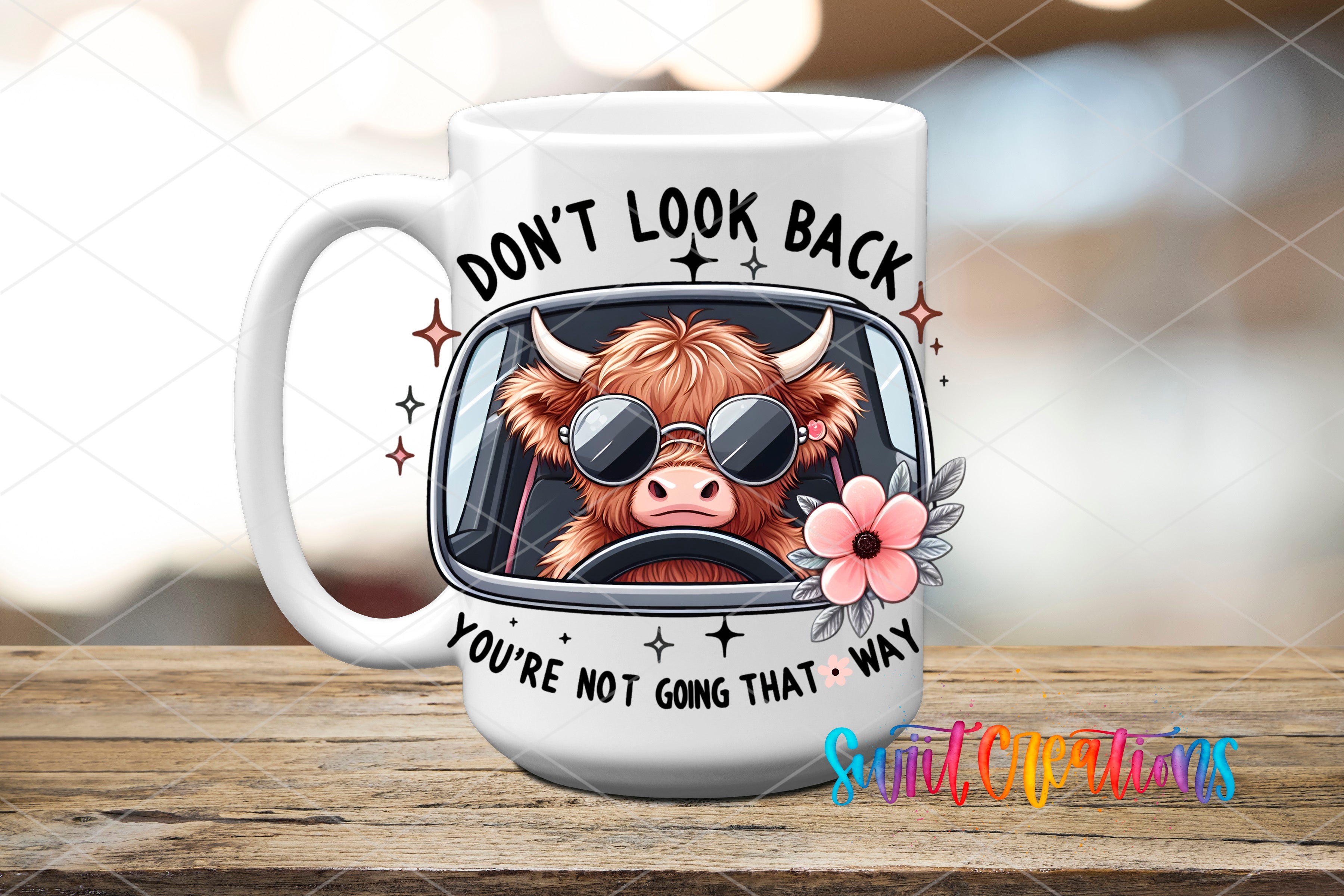 Swiit Creations UV DTF Don't Look Back Cow transfer applied to a white ceramic mug