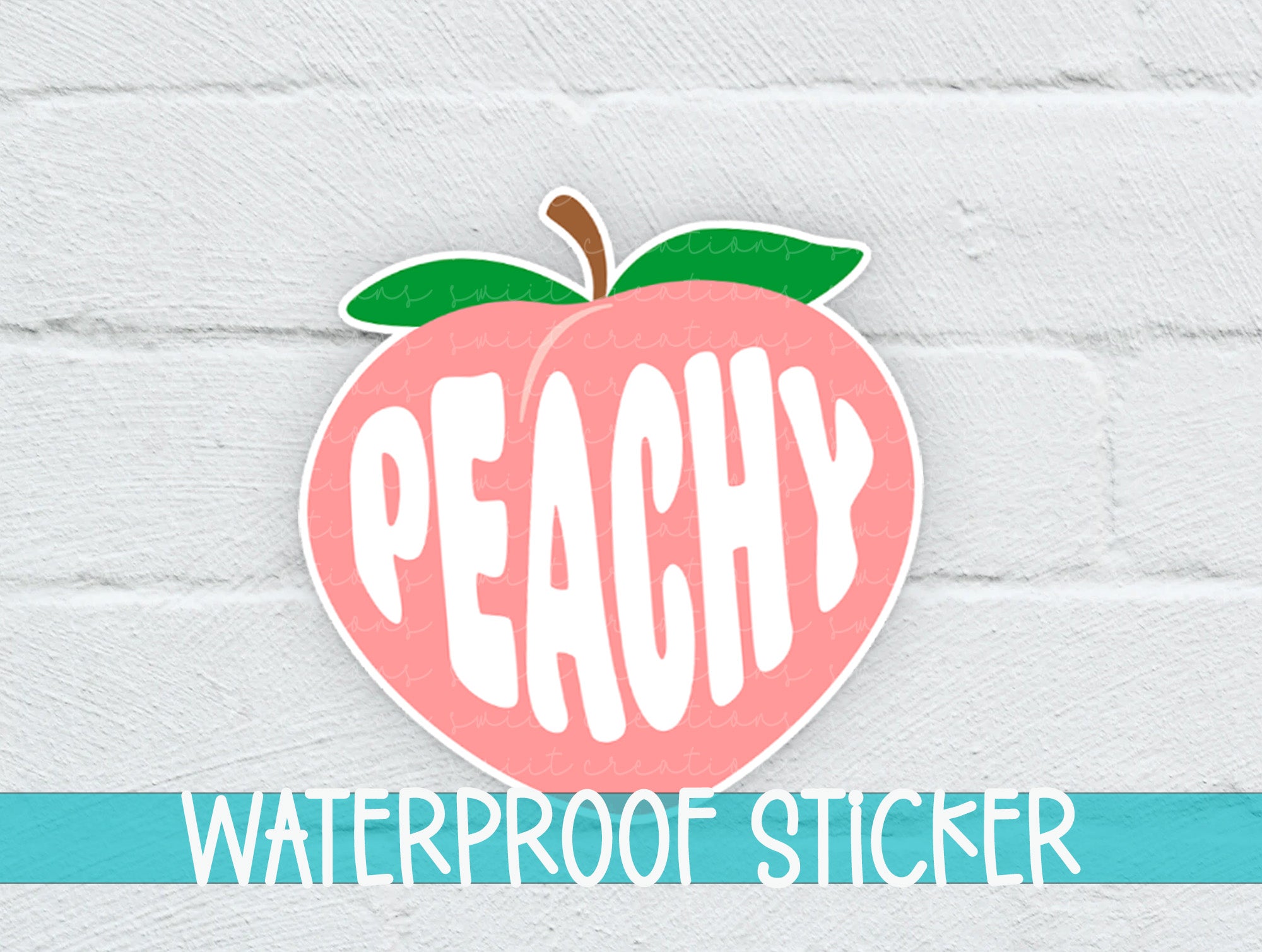a peachy waterproof sticker on a white brick wall