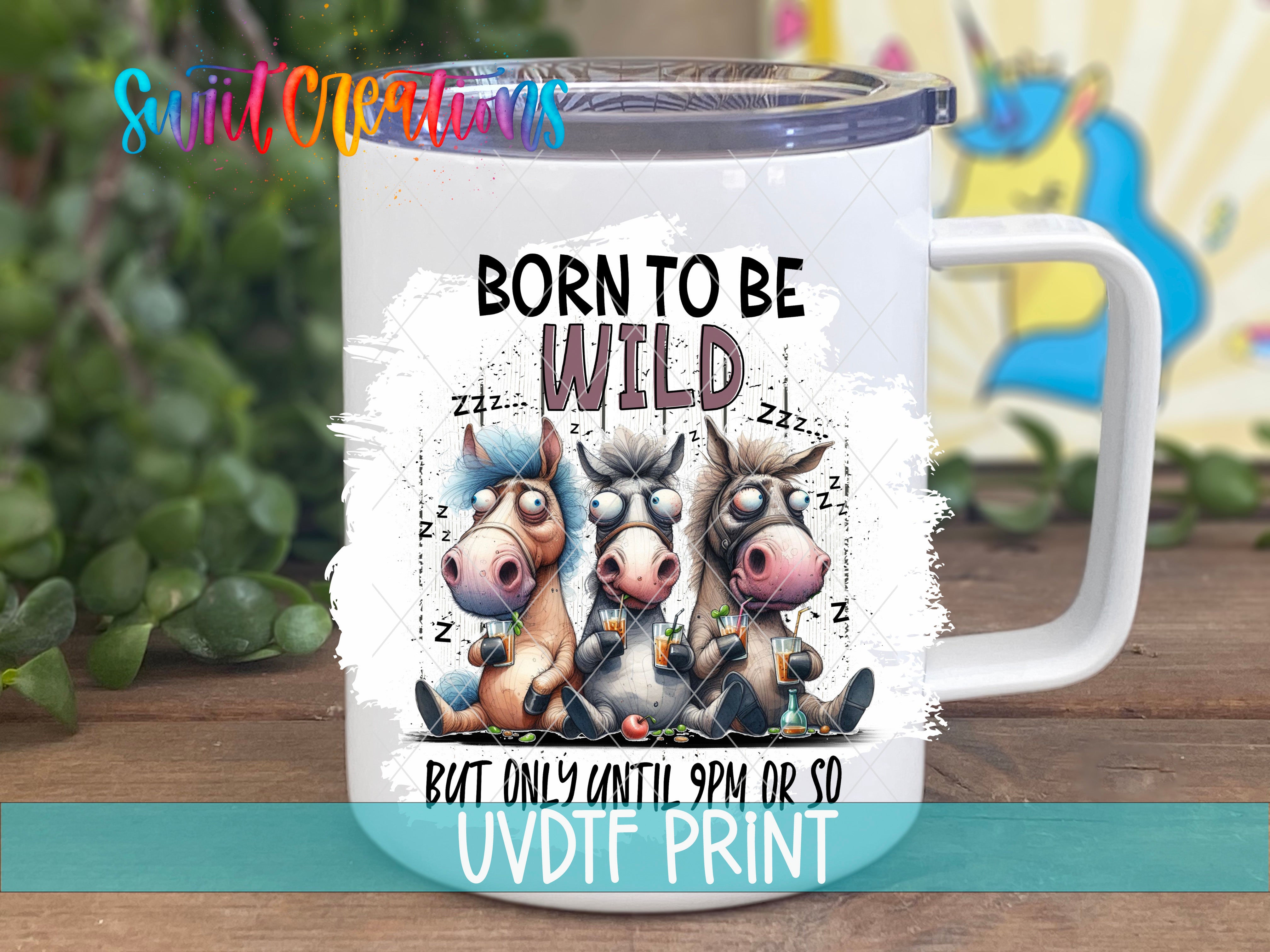 a white coffee mug with the words born to be wild on it