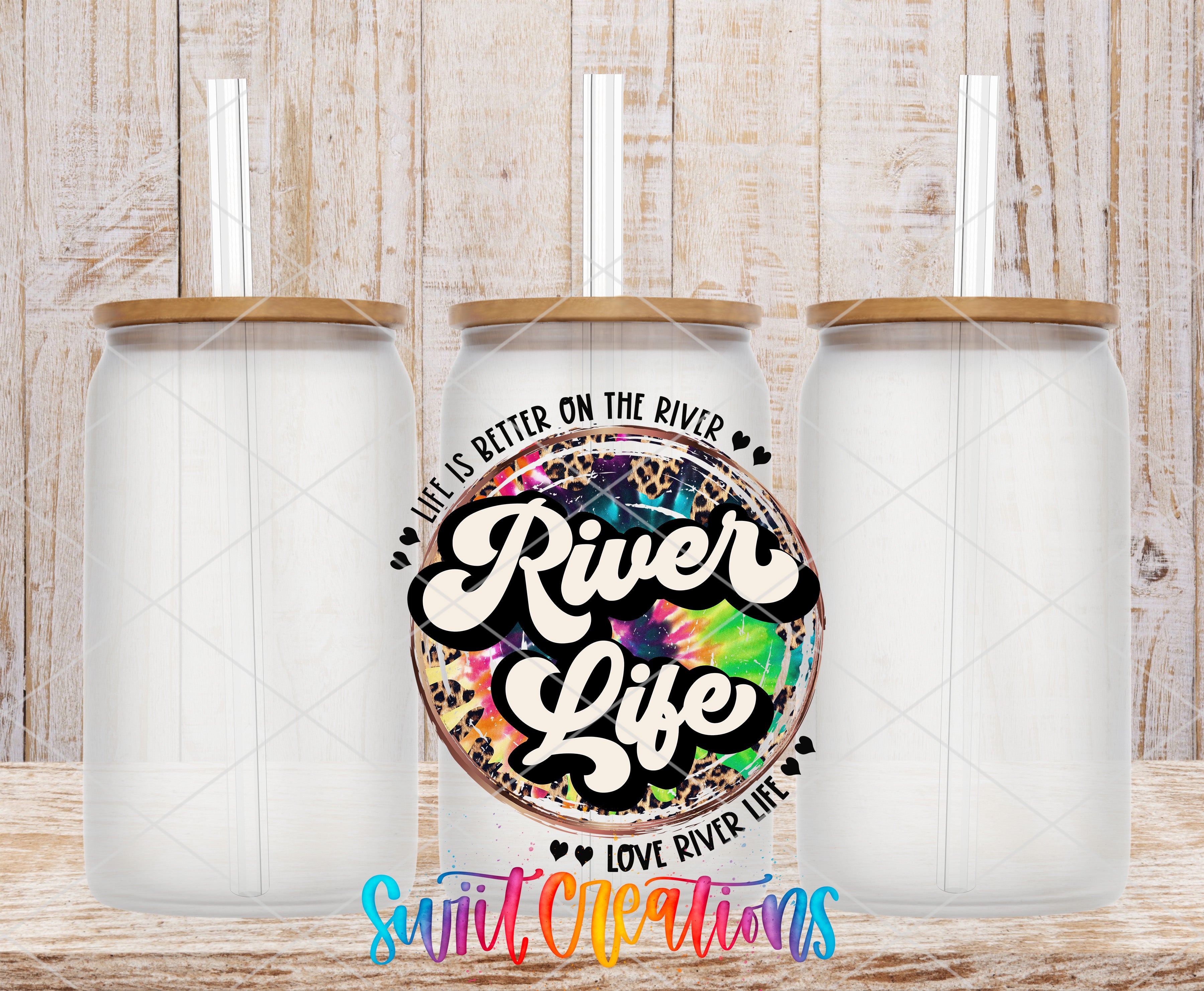 Swiit Creations UV DTF River Life transfer shown on a clear glass can set