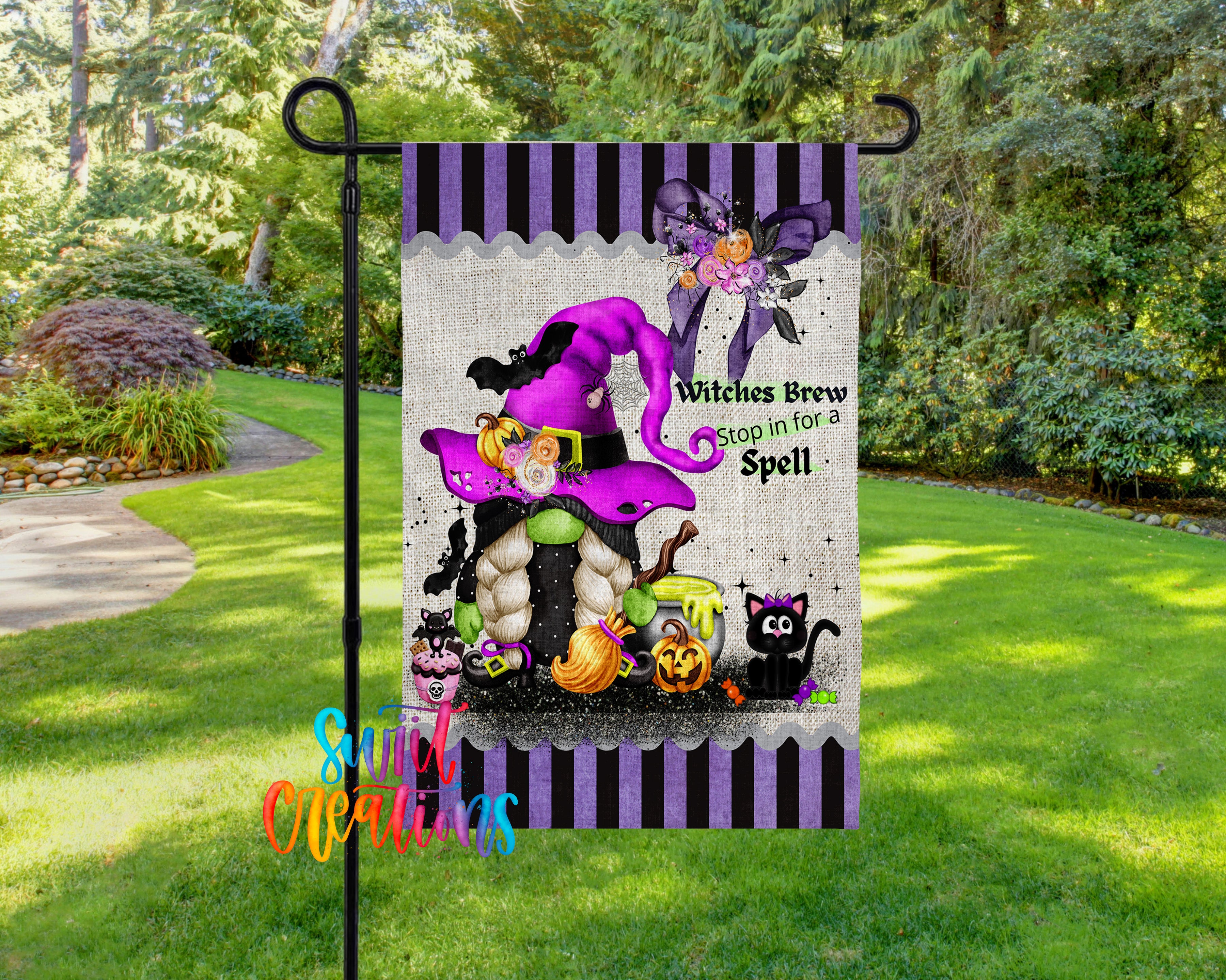 A Halloween-themed garden flag featuring a purple witch's hat, a gnome, pumpkins, and a cat, with the text "Witches Brew Stop in for a Spell!"