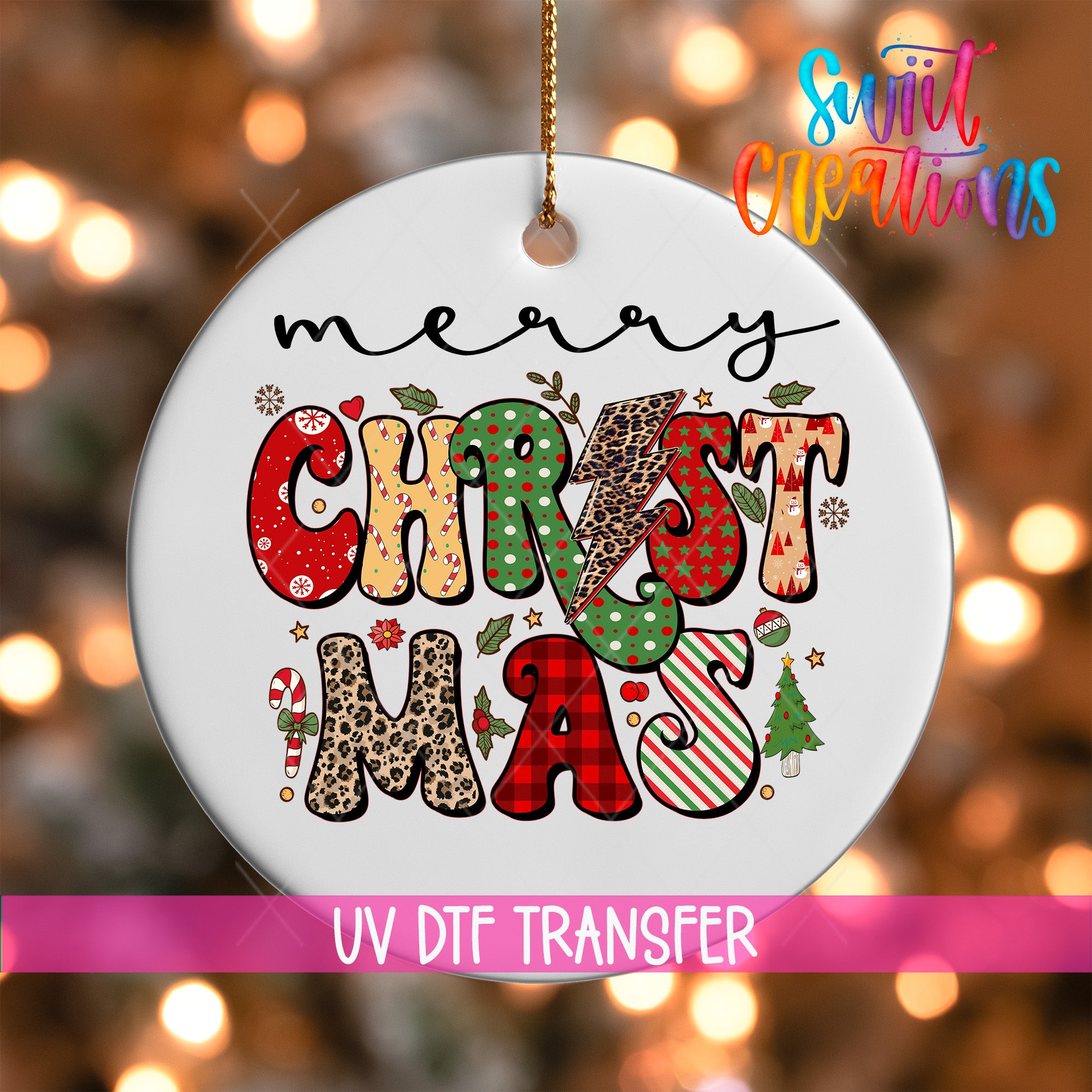 A white ornament with the text "MERRY CHRISTMAS" in a colorful, decorative font.