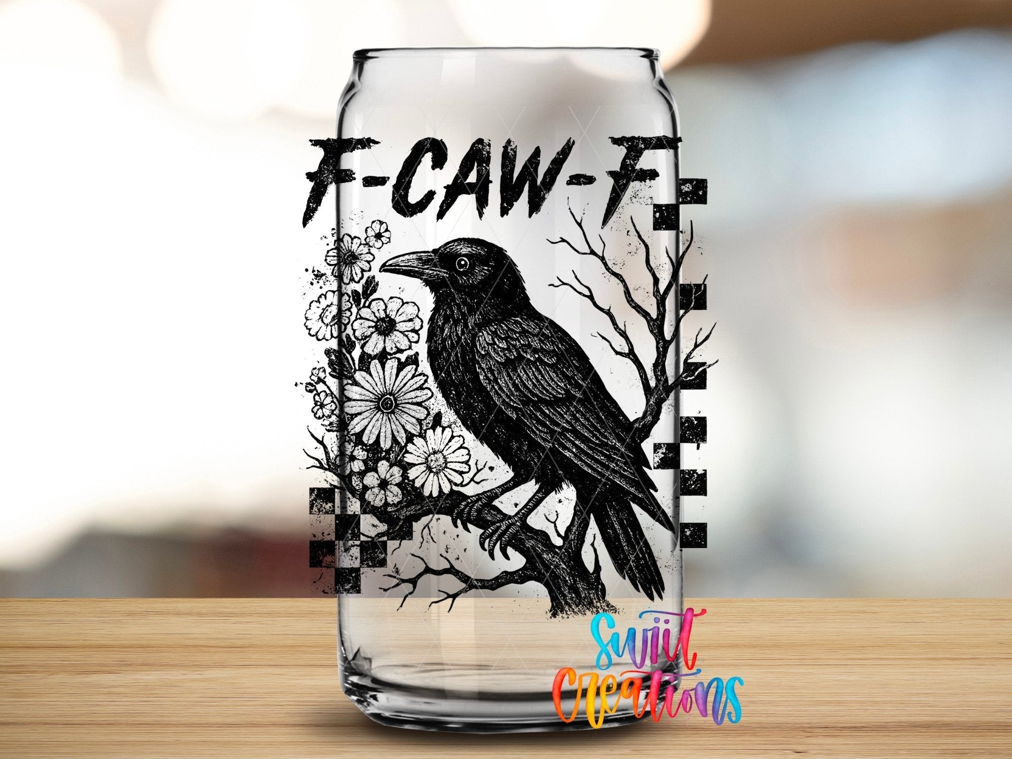 F-CAW-F Raven Gothic UV DTF transfer applied to a clear glass can from Swiit Creations