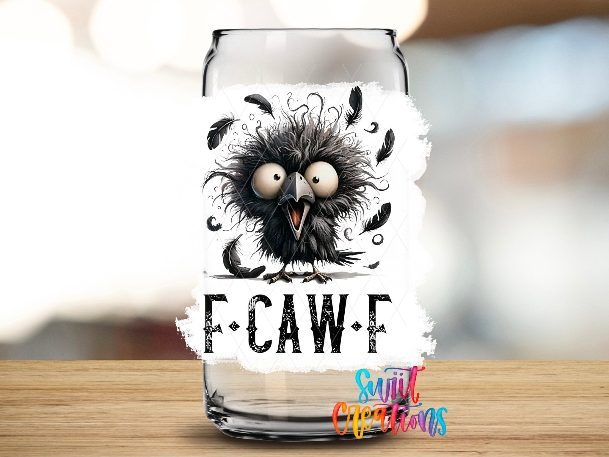 F Caw F UV DTF transfer applied to a clear glass can from Swiit Creations