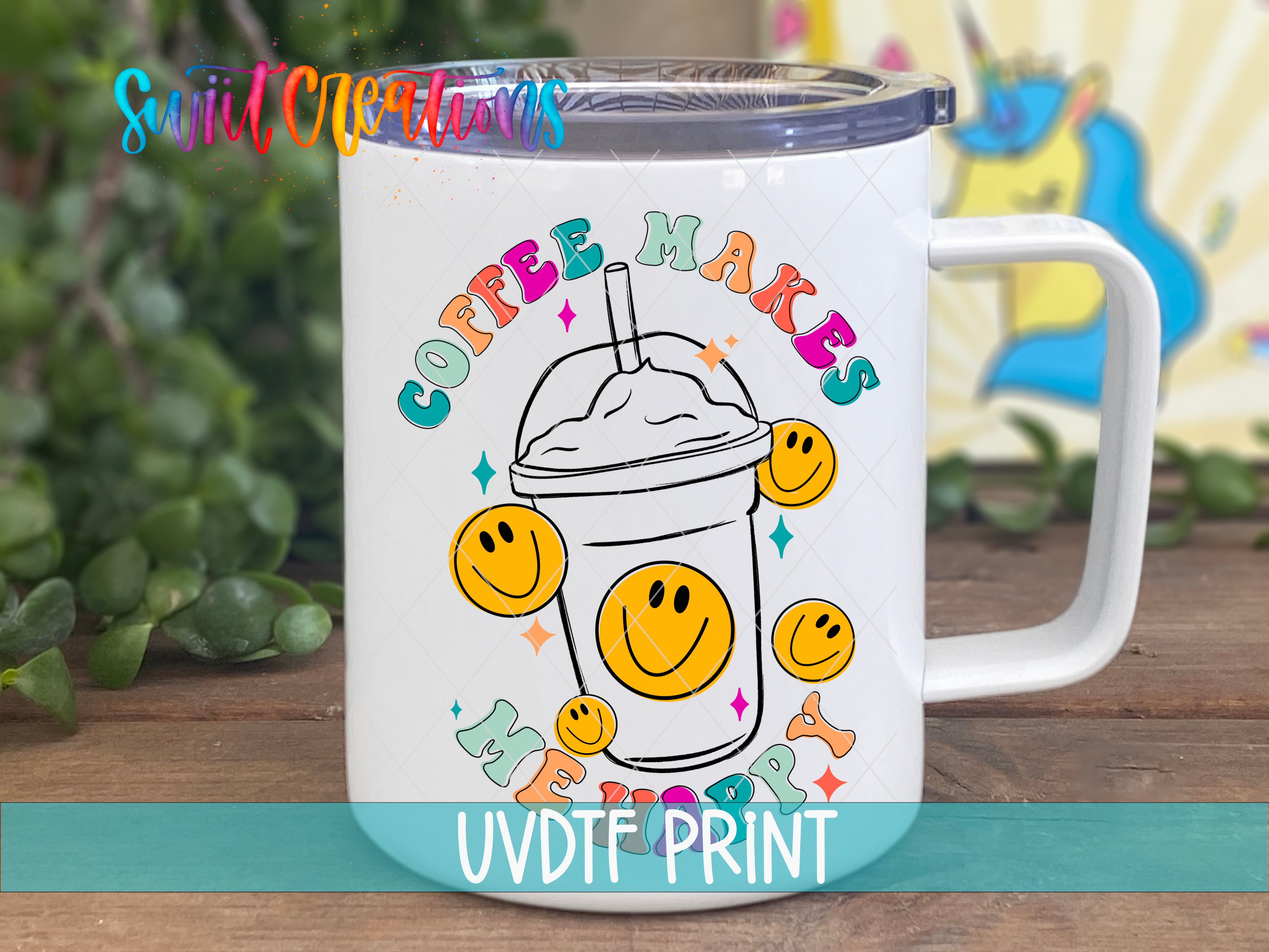 a white coffee mug with smiley faces on it
