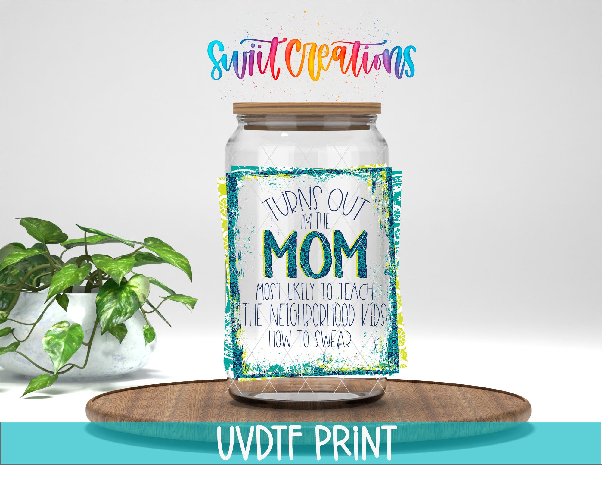 a clear glass jar with a label that reads "Turns out I'm the MOM. Most likely to teach the Neighborhood kids how to swear." The jar is placed on a wooden tray, and there is a potted plant in the background.