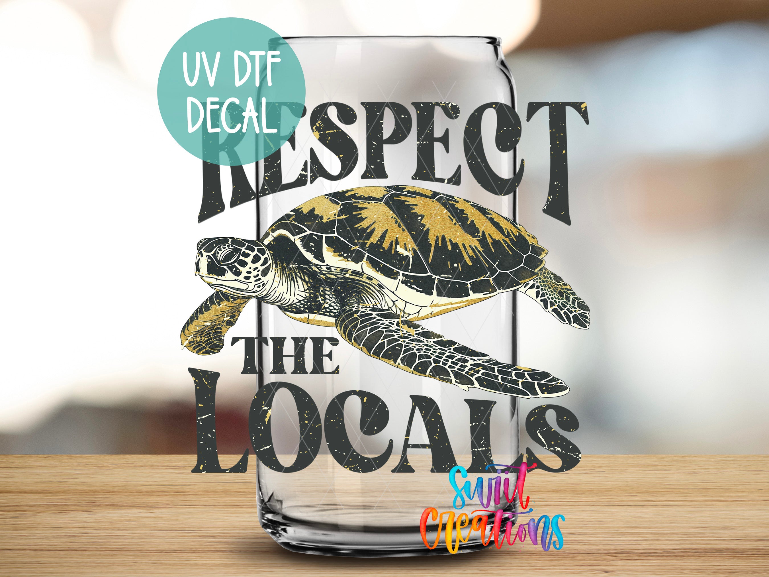 a glass with a picture of a turtle on it