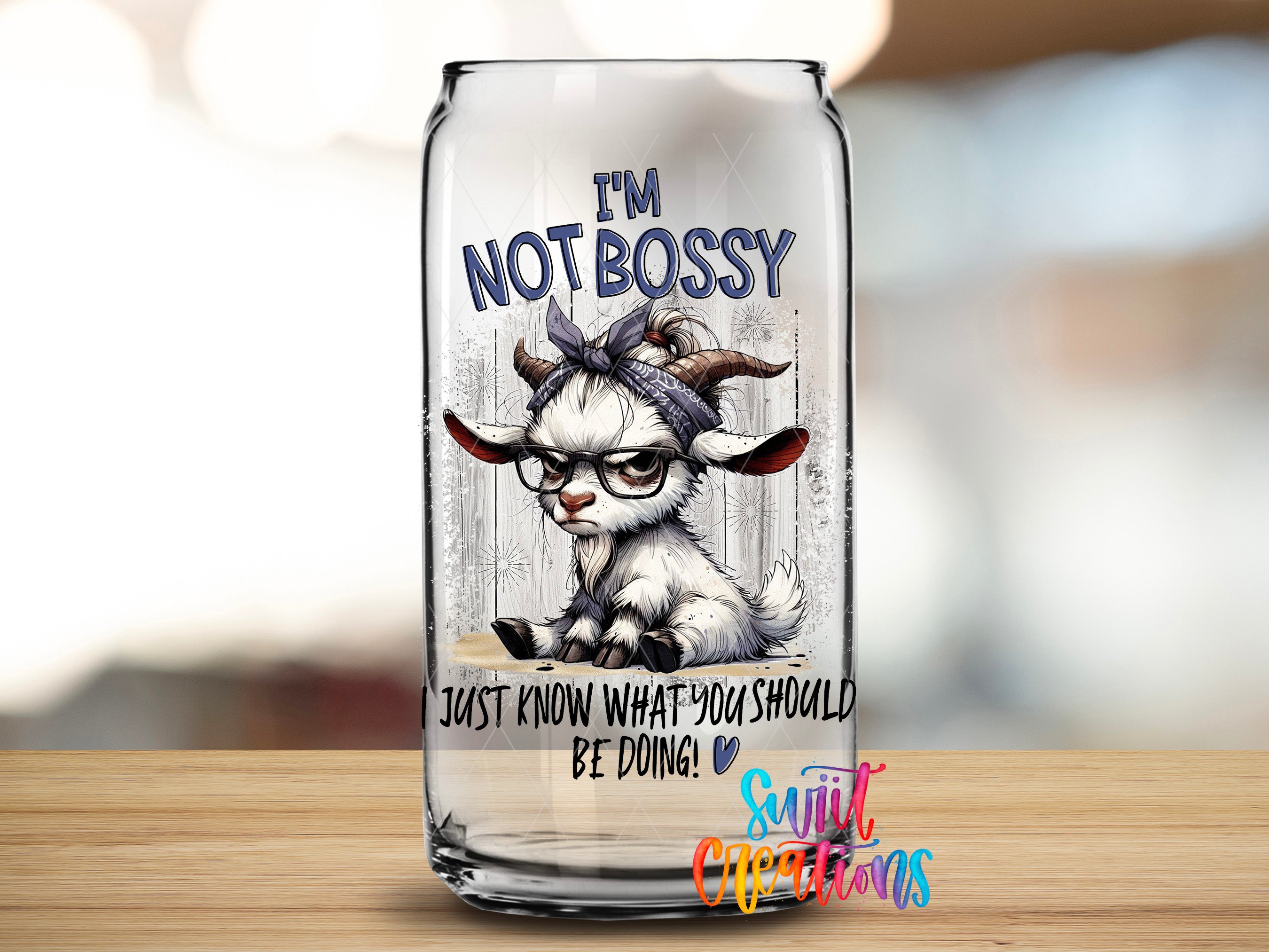 A glass can with a cartoon goat wearing glasses and a bandana, along with the text "I'm NOT BOSSY" and "JUST KNOW WHAT YOU SHOULD BE DOING!"