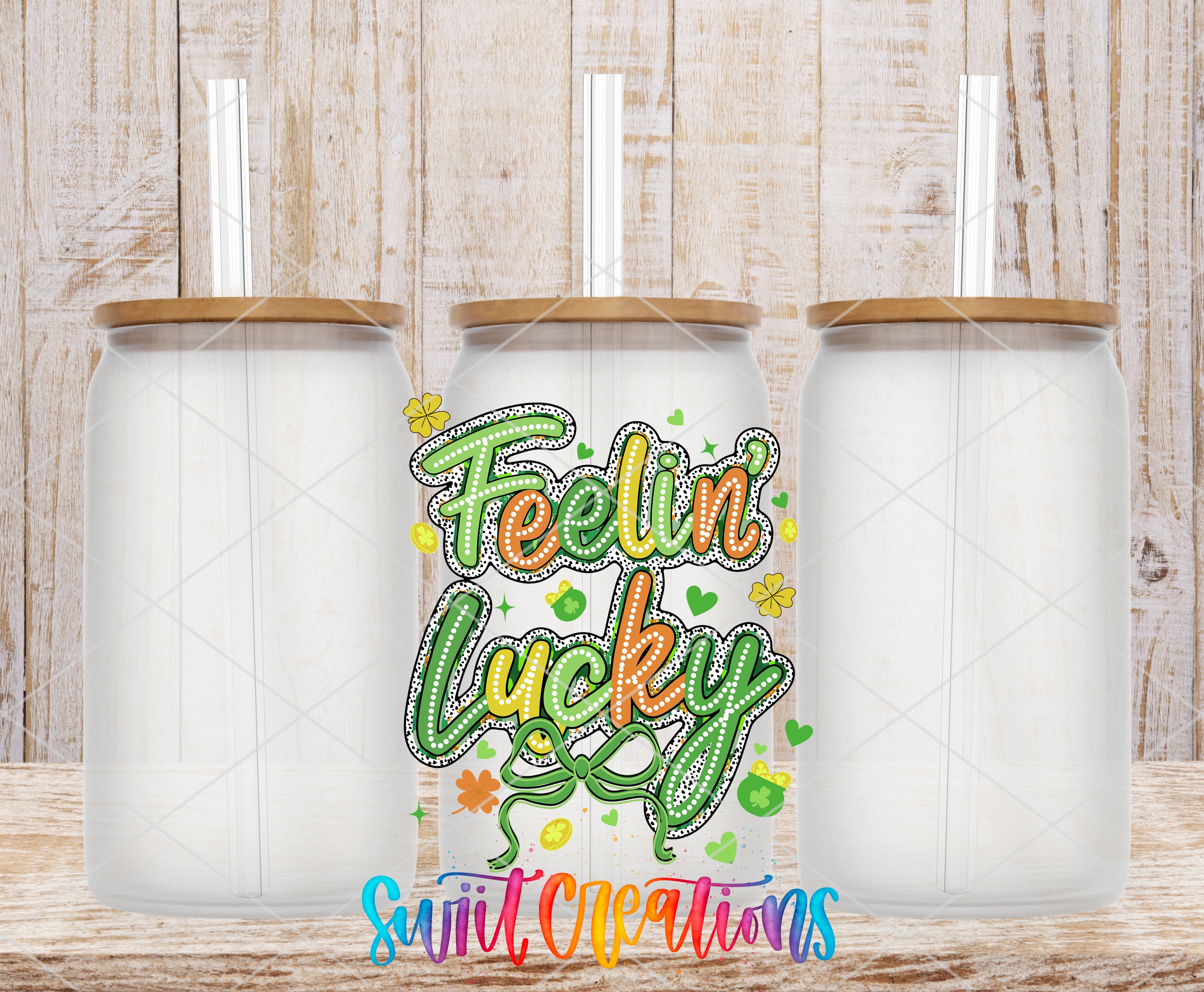 three clear glass jars with wooden lids, arranged in a row against a wooden background. The jars have straws attached to their lids. In the center of the image, there is a colorful graphic design with the text "Feelin' Lucky" written in a stylized font.