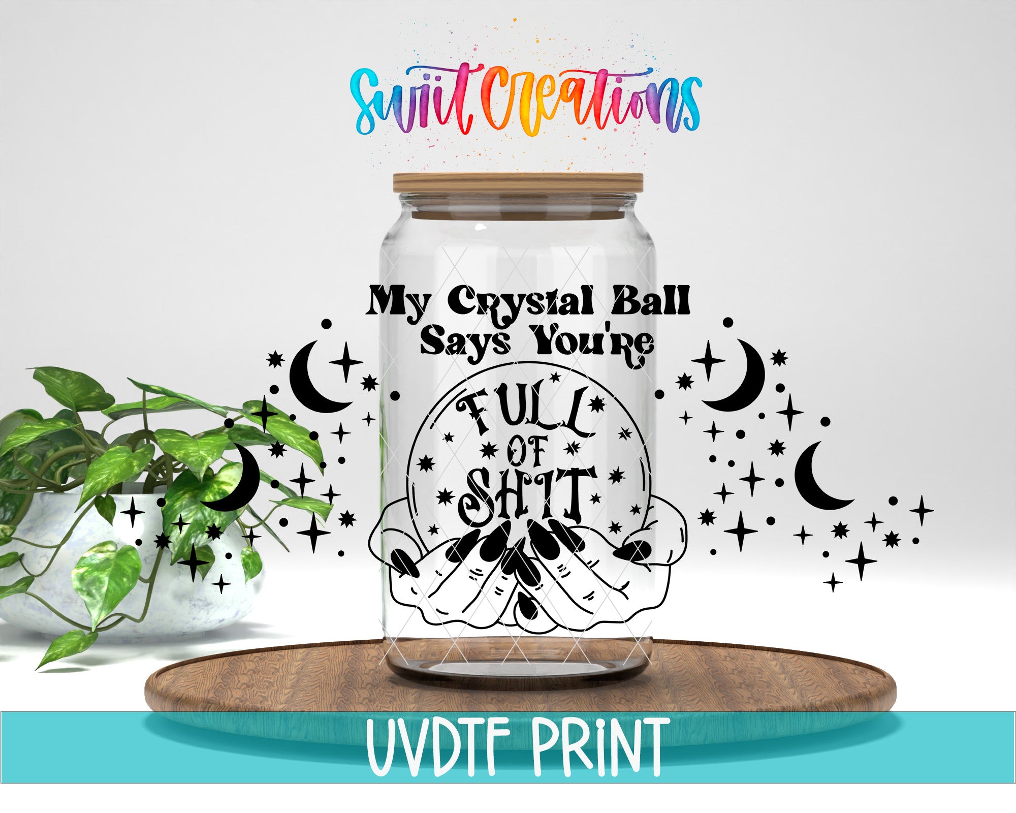 a clear glass jar with a hand holding a crystal ball, surrounded by stars and crescent moons, with the text "My Crystal Ball Says You're Full of Shitt" and "UVDF PRINT" printed on it.