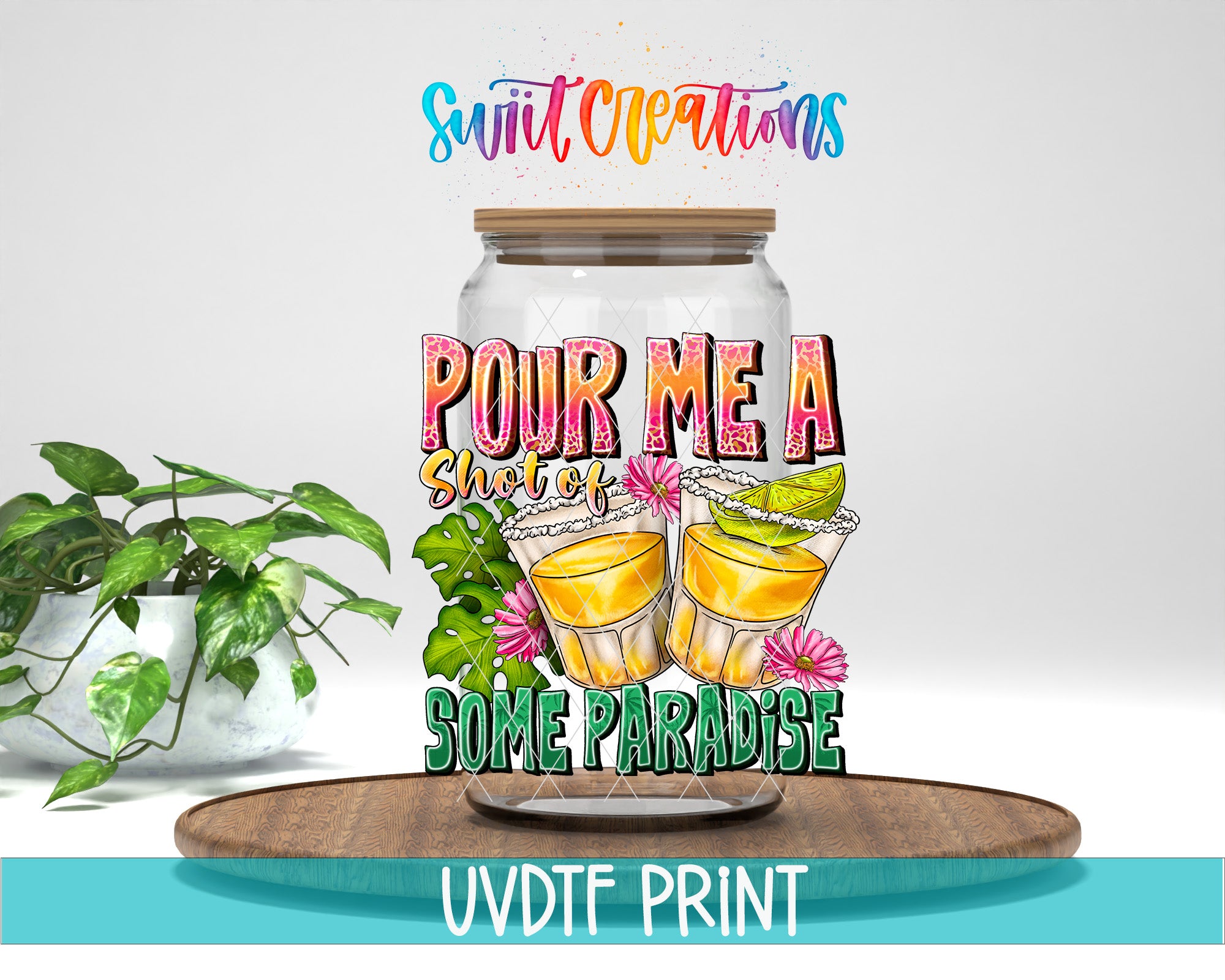 a glass jar with a colorful design, including a shot glass, flowers, and text that says "POUR ME A SHOT OF SOME PARADISE".