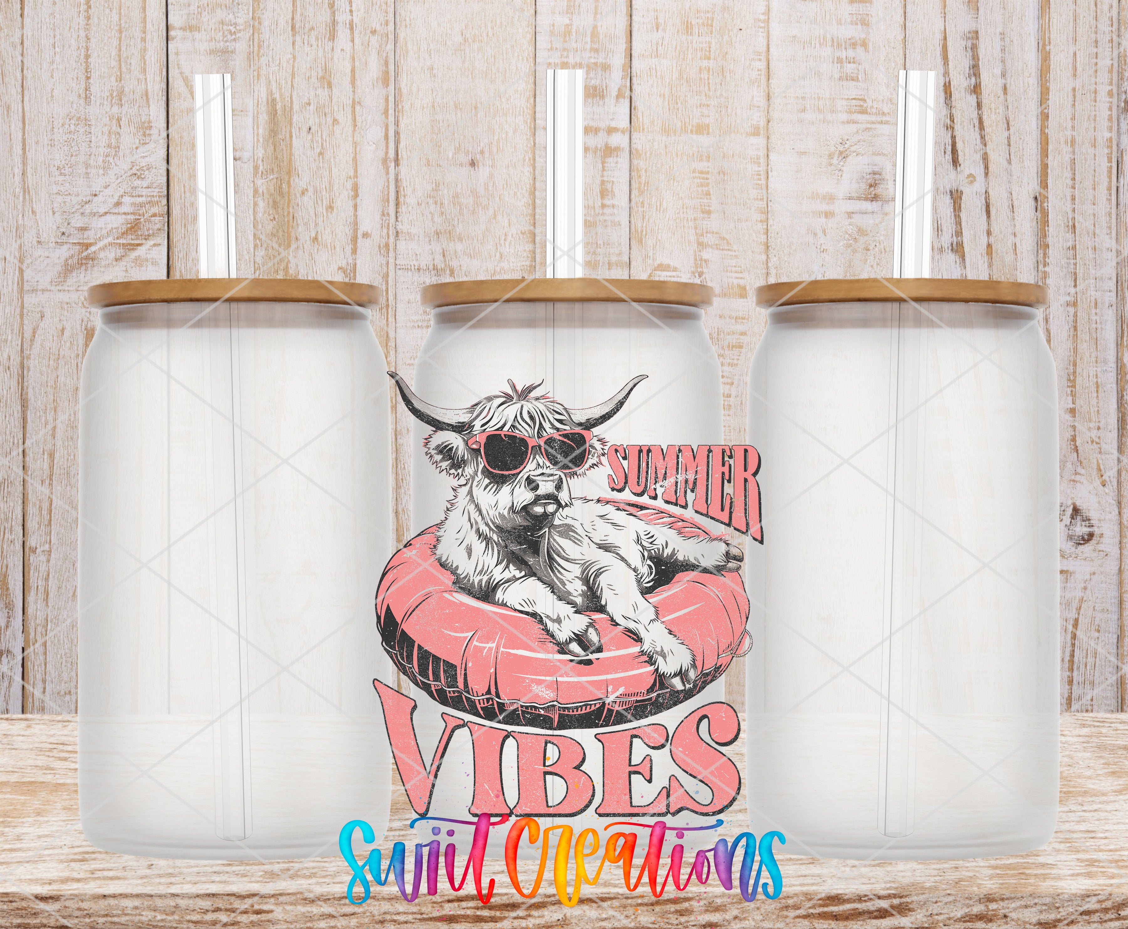 Swiit Creations UV DTF Summer Vibes Cow transfer shown on a clear glass can set