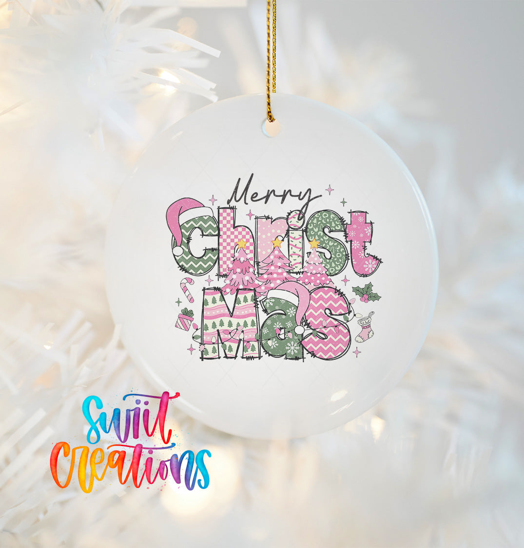A white Christmas ornament with the text "Merry Christmas" written in a colorful, stylized font.