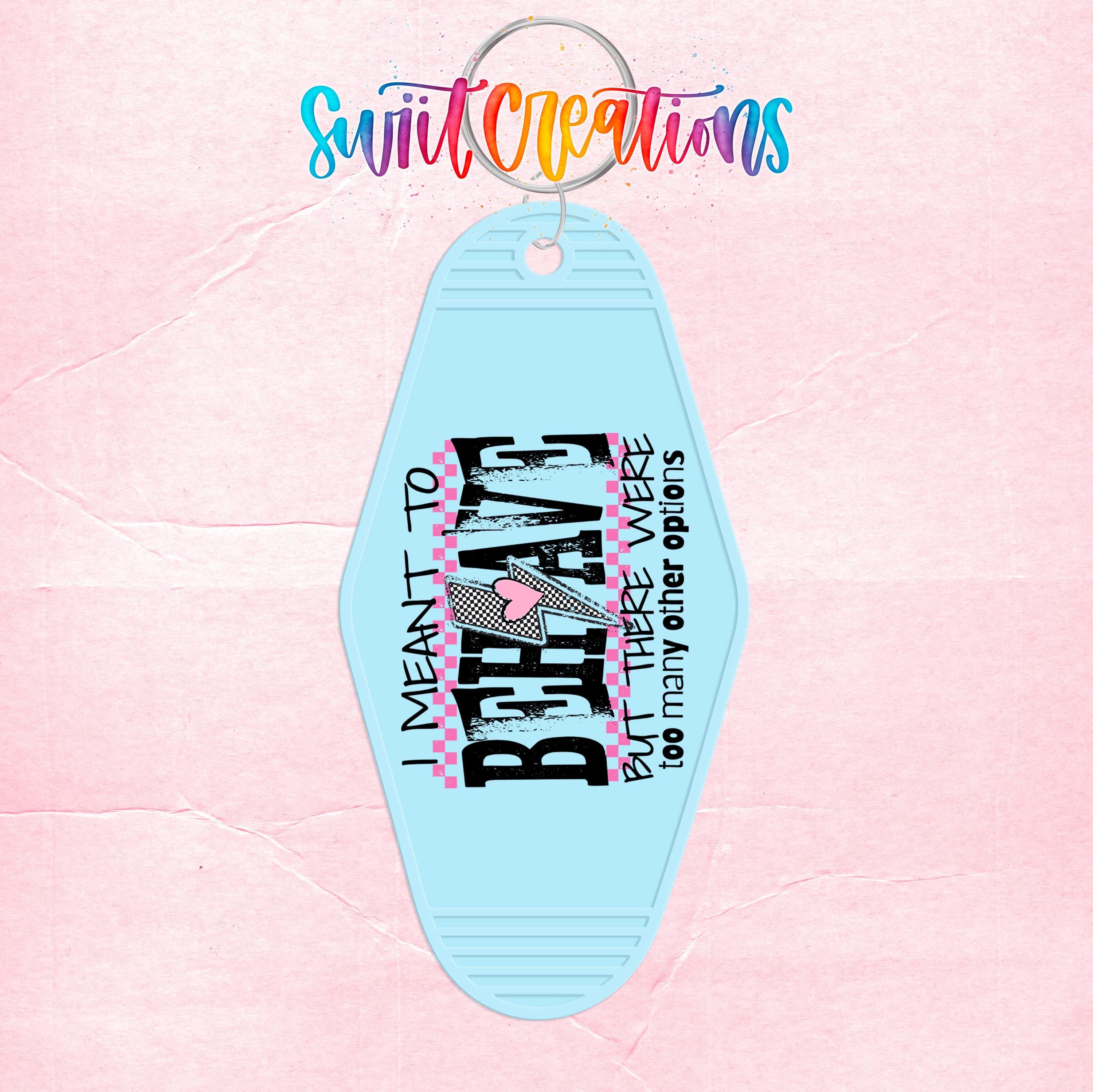 A light blue keychain with a colorful design and text on it.