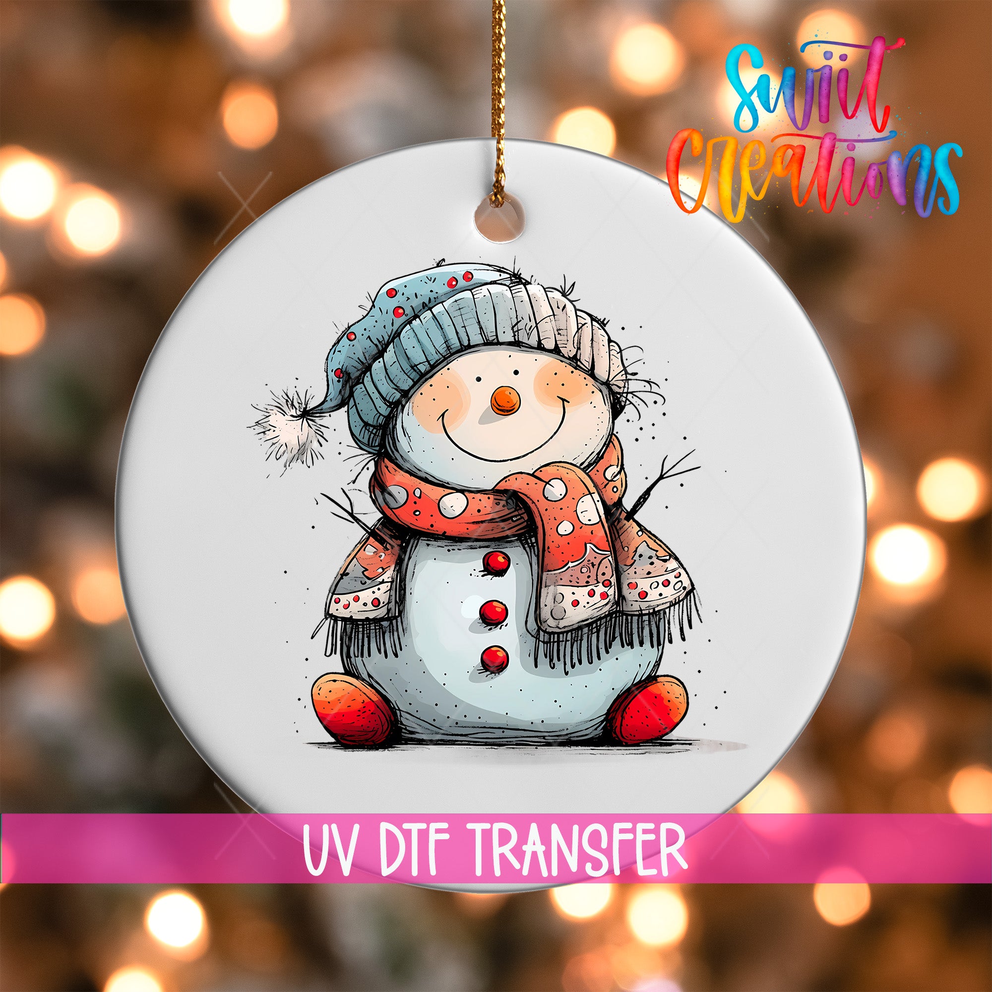 A snowman ornament with a hat and scarf, sitting on a white background with a pink ribbon around it.