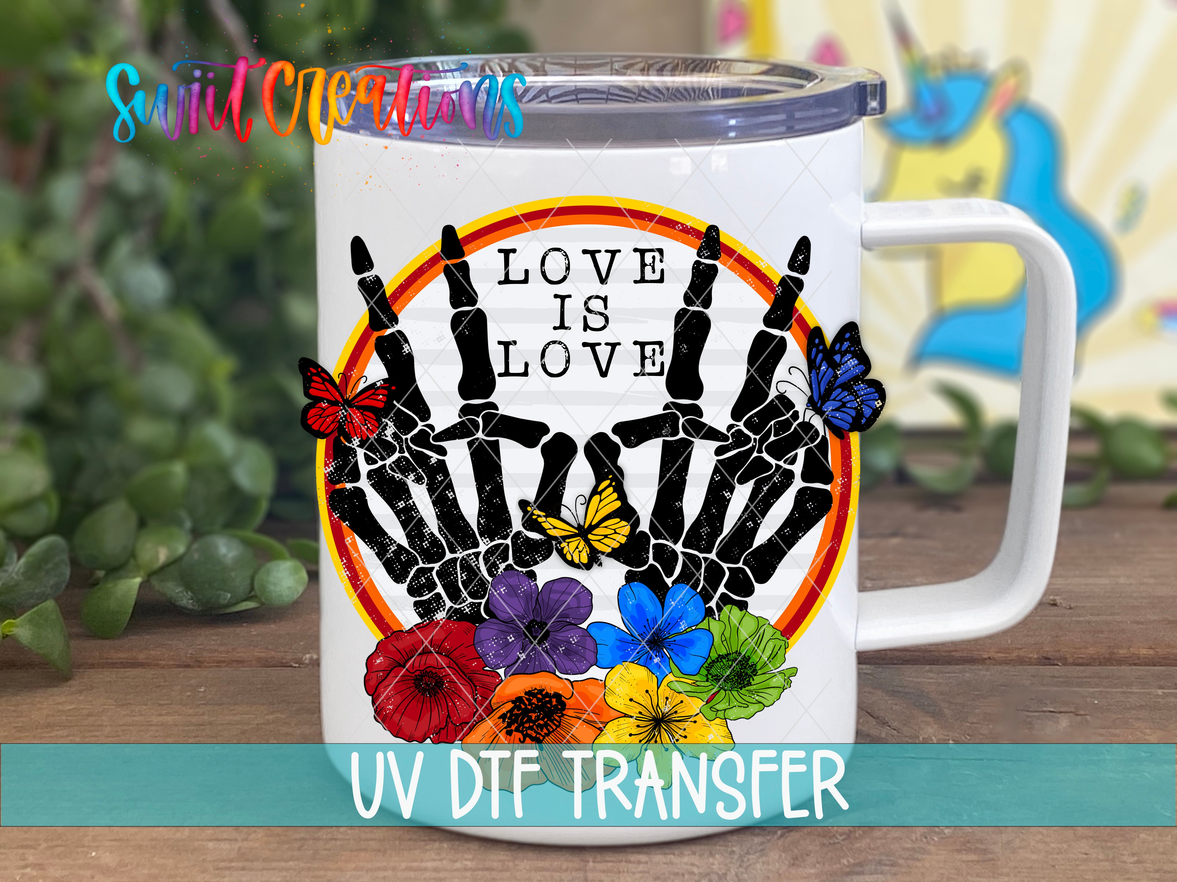 Swiit Creations Love Is Love UV DTF transfer displayed on a white coffee mug