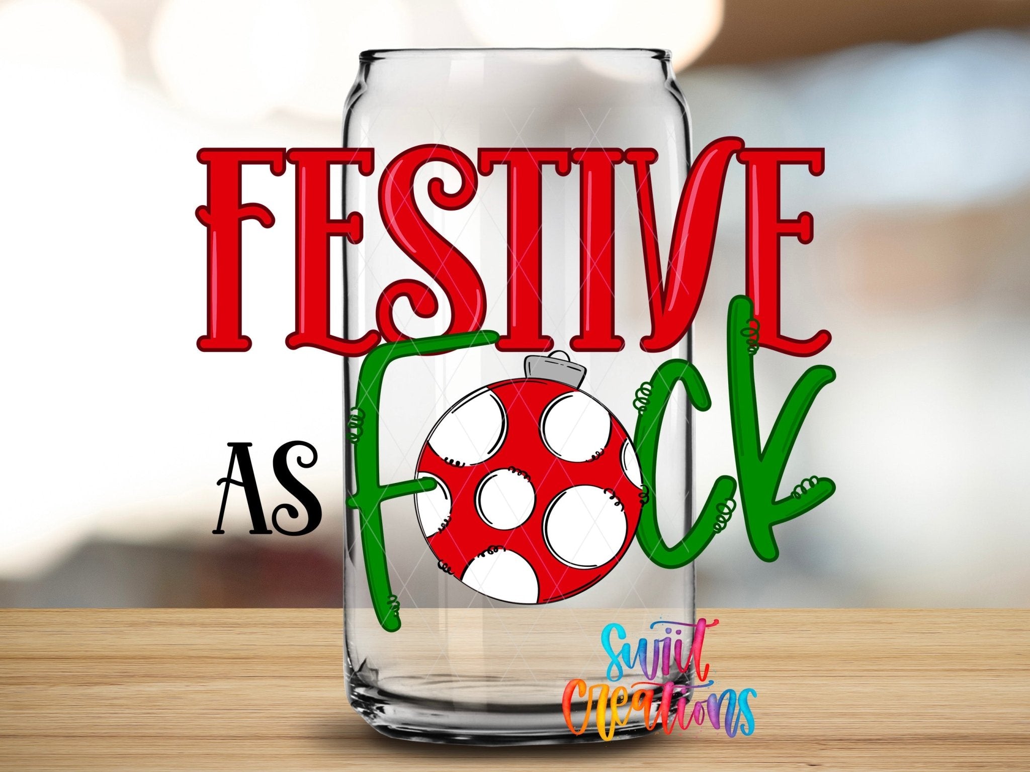 Festive As F Christmas UV DTF transfer applied to a clear glass can from Swiit Creations