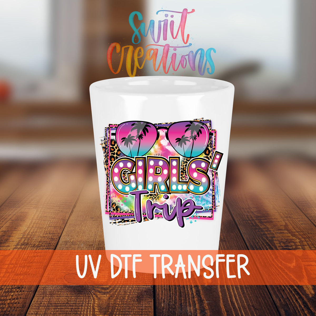 Girls Trip shot glass transfer on a white shot glass on a wooden table