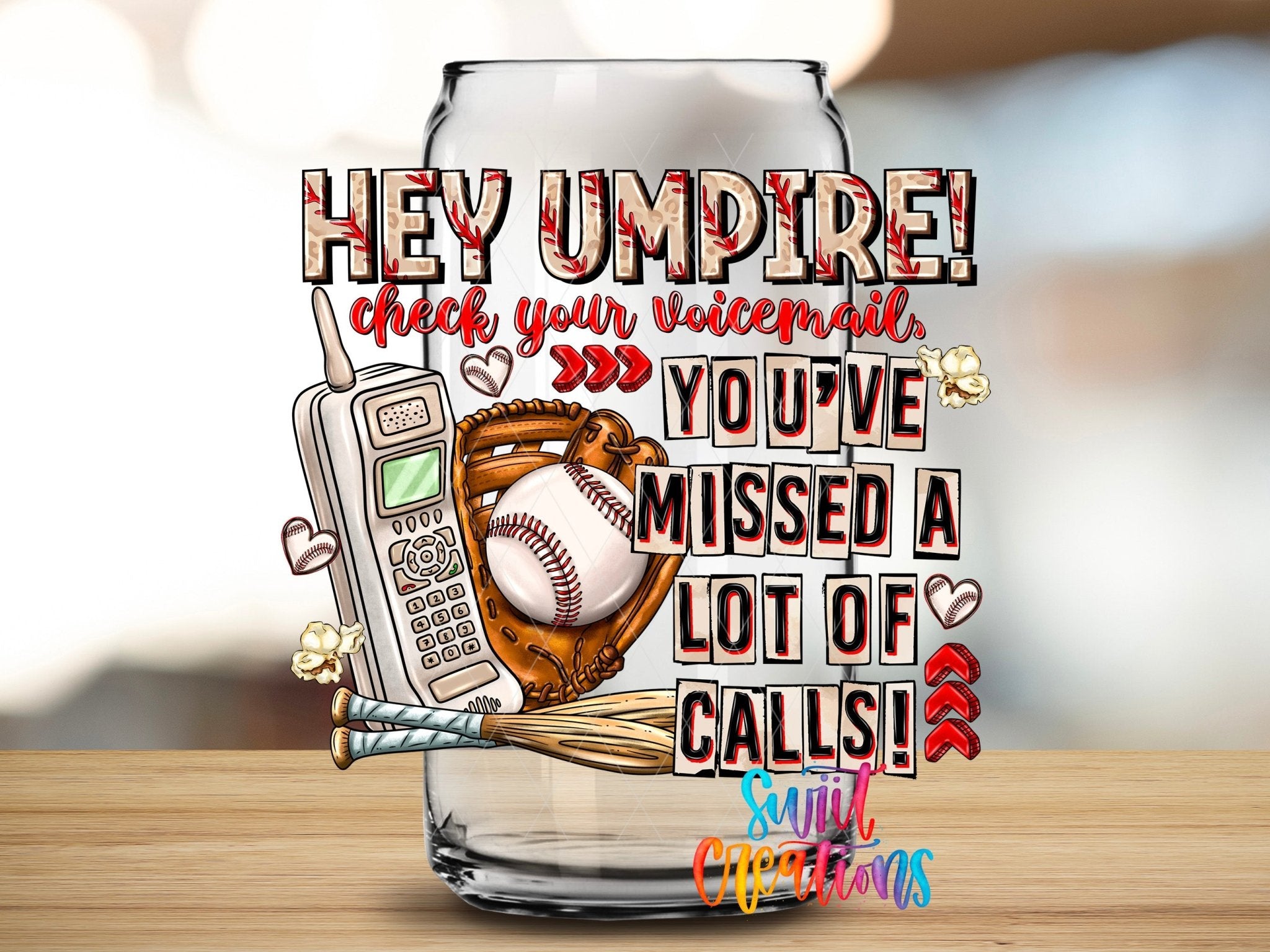 Hey Umpire Funny Baseball UV DTF transfer applied to a clear glass can from Swiit Creations