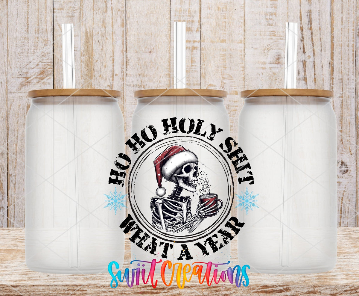 Swiit Creations UV DTF Holy Shit What a Year Christmas transfer shown on a clear glass can set