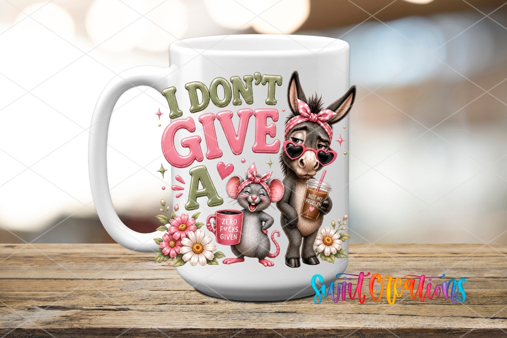 I Don't Give A Rat's Ass Donkey Mouse UV DTF transfer displayed on a white ceramic mug from Swiit Creations