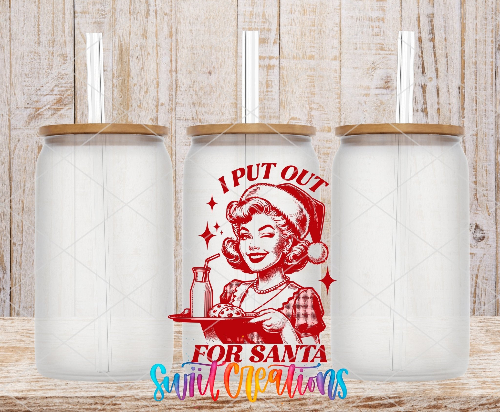 Swiit Creations UV DTF I Put Out For Santa Christmas transfer shown on a clear glass can set