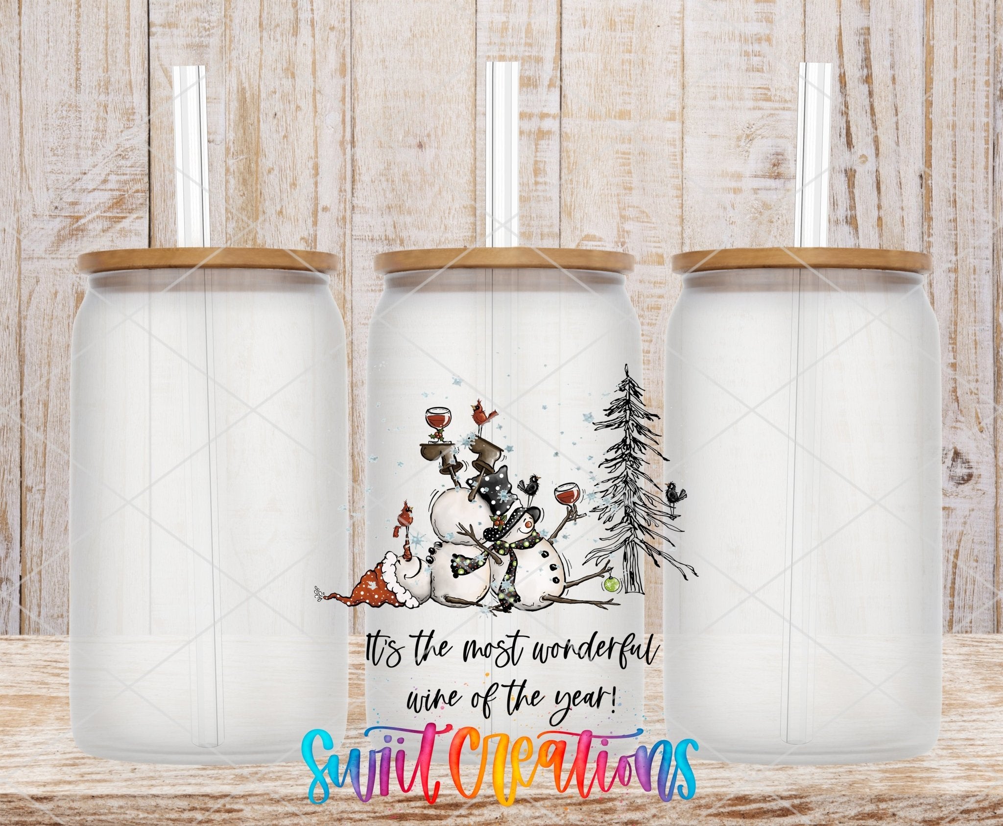 Swiit Creations UV DTF Wonderful Wine of the Year Snowman transfer shown on a clear glass can set