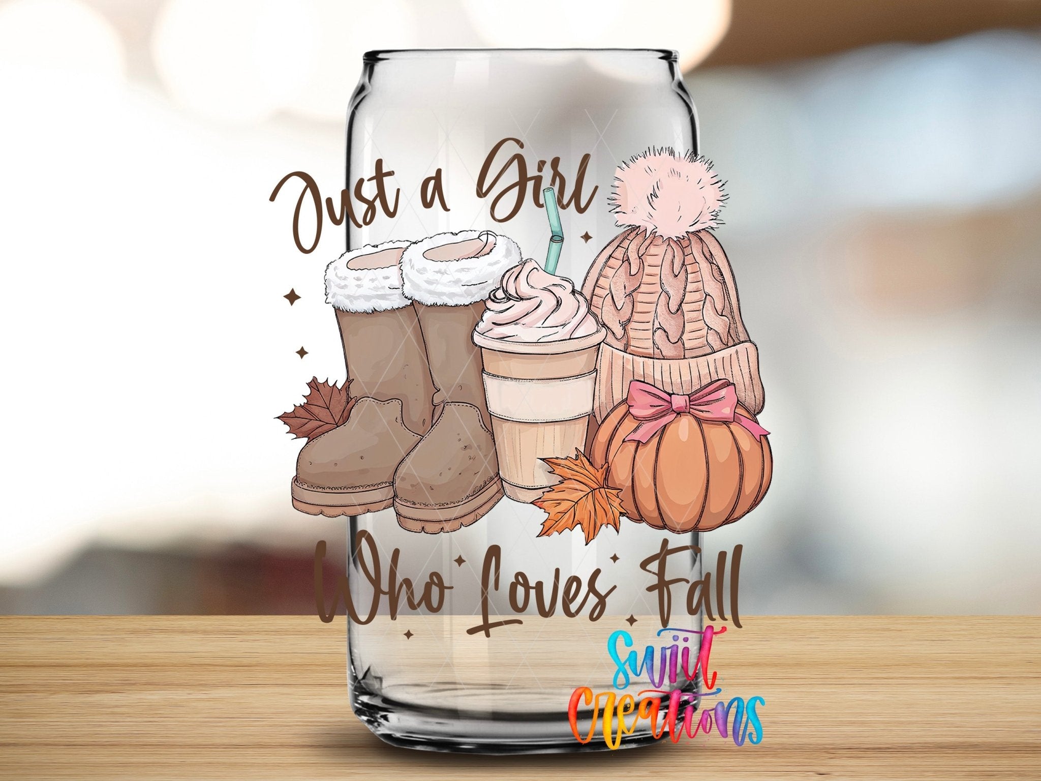 Just A Girl Who Loves Fall UV DTF transfer applied to a clear glass can from Swiit Creations