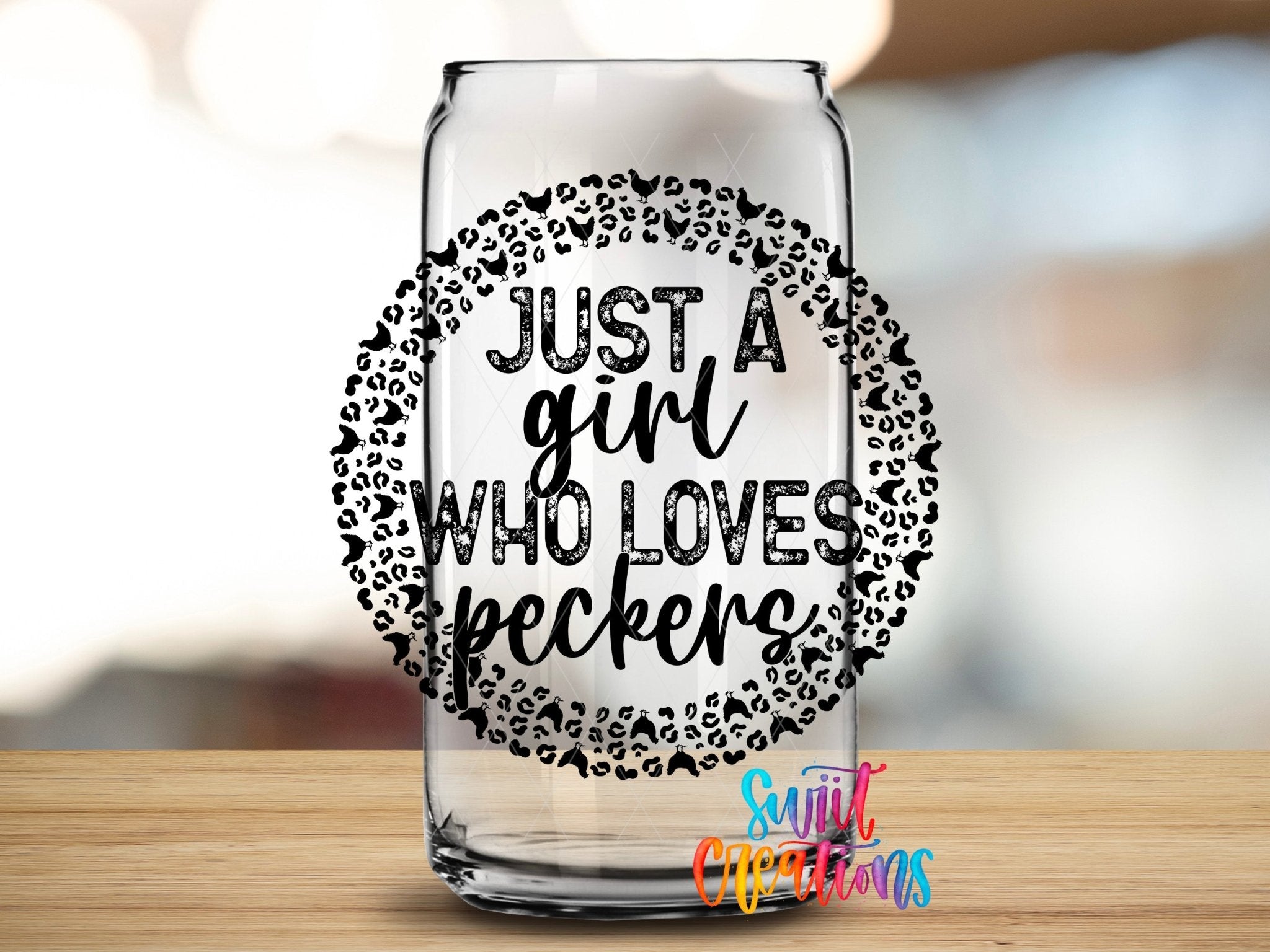 Just a Girl Who Loves Peckers Funny UV DTF transfer applied to a clear glass can from Swiit Creations
