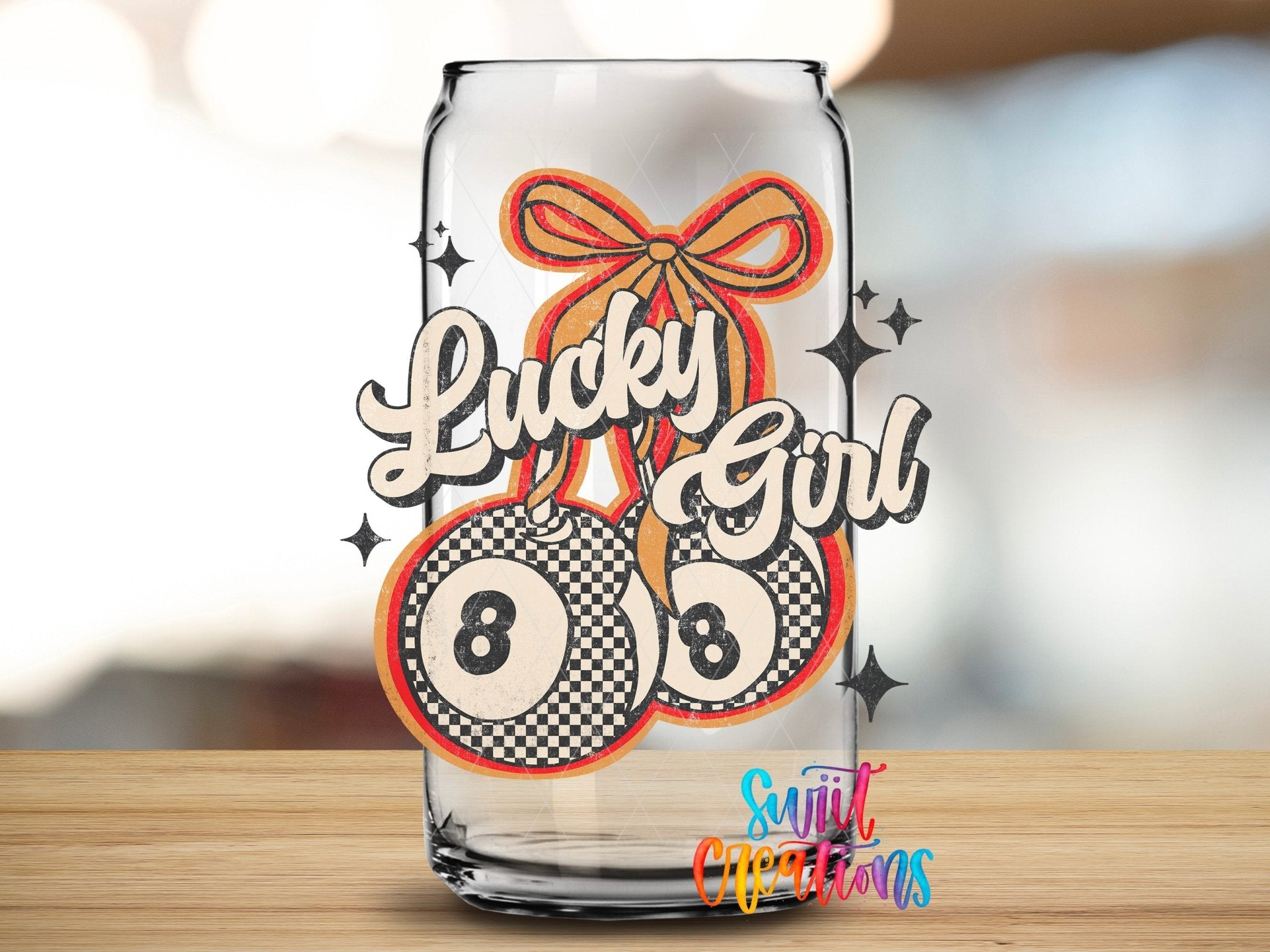 Lucky Girl UV DTF transfer applied to a clear glass can from Swiit Creations