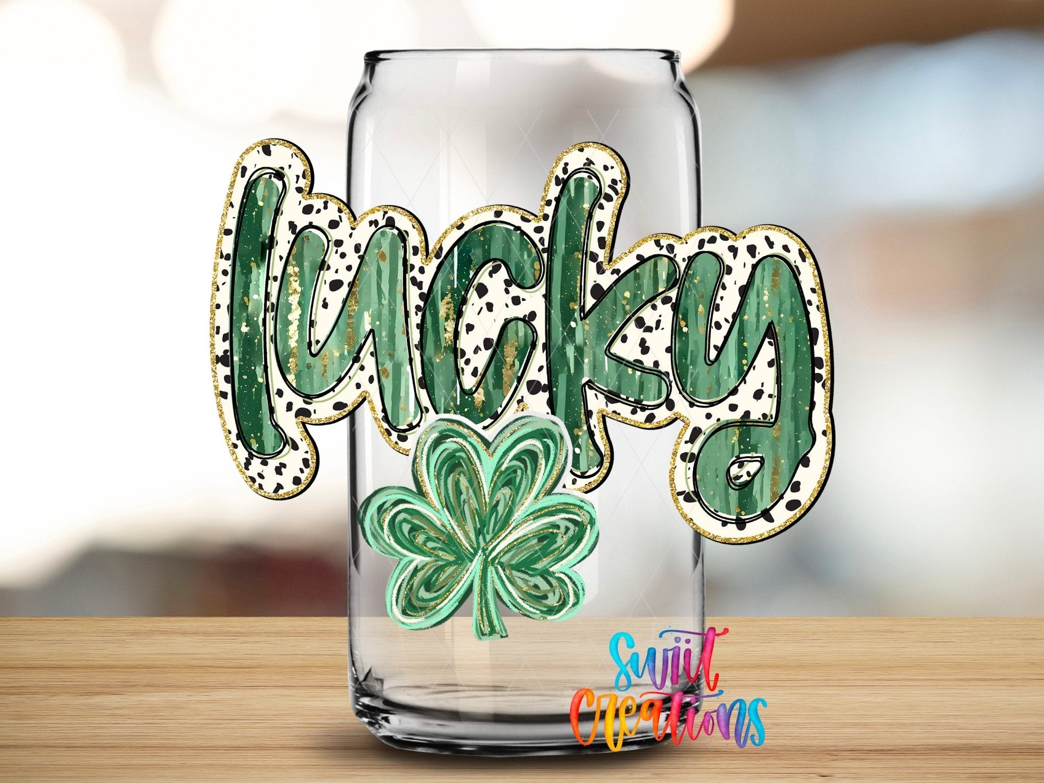 Swiit Creations UV DTF Lucky transfer applied to a clear glass can