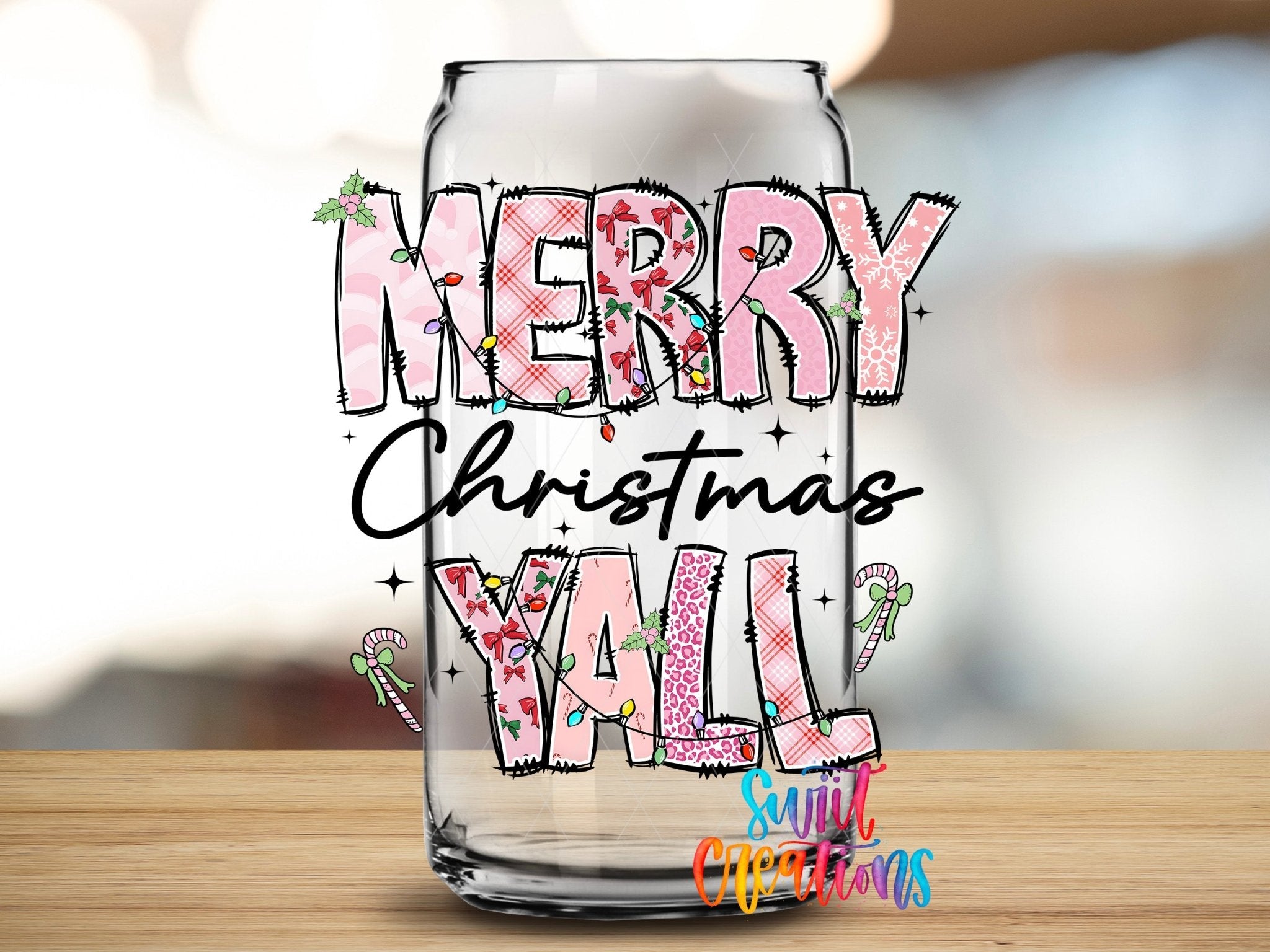 Swiit Creations UV DTF Merry Christmas Y’all Patchwork transfer applied to a clear glass can